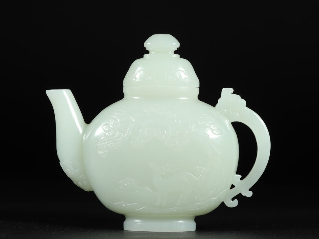 An Exquisite White Jade Pine and Crane Pattern Ewer: An Exquisite White Jade Pine and Crane Pattern Ewer ,Qing Dynasty, China,Size:4.9inx1.8inx4.3in,Weight:308g 白玉松鹤纹执壶 ,中国清代