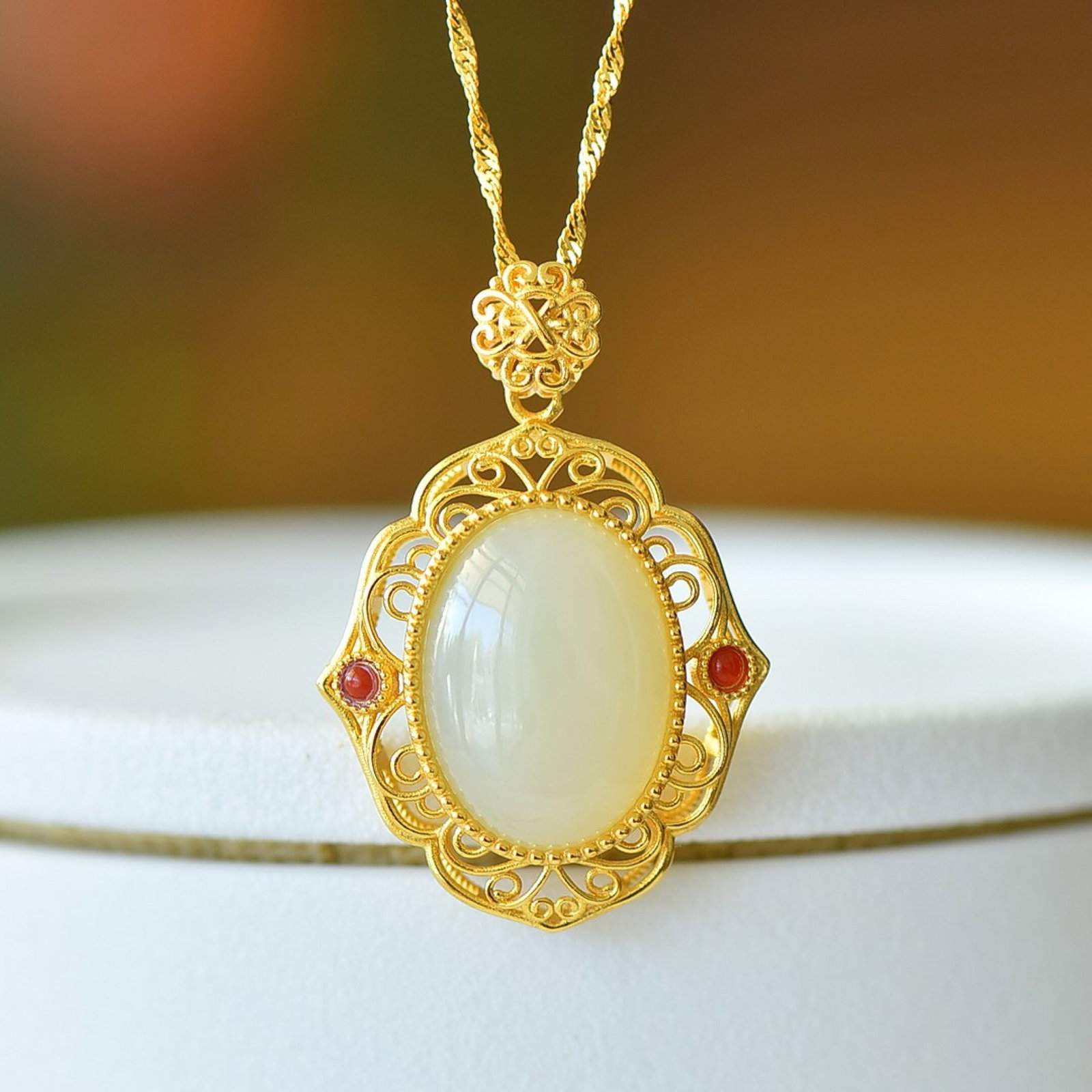 An Exquisite Sterling Silver-Gold Plated Inlaid White Jade Pendant: An Exquisite Sterling Silver-Gold Plated Inlaid White Jade Pendant 纯银镀金镶白玉吊坠