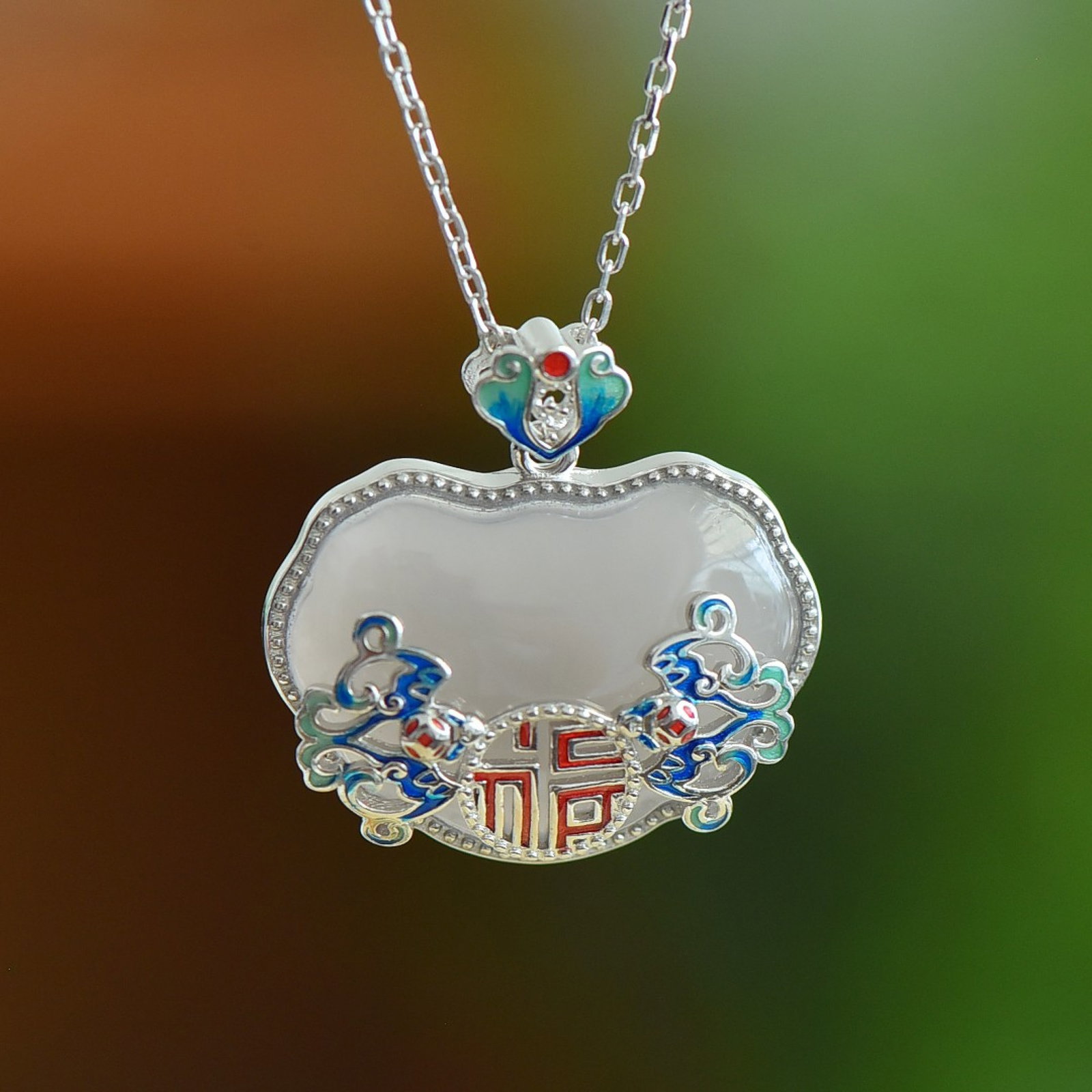 An Exquisite Sterling Silver-Gold Plated Inlaid White Jade Enamel Pendant: An Exquisite Sterling Silver-Gold Plated Inlaid White Jade Enamel Pendant 纯银镶白玉珐琅吊坠