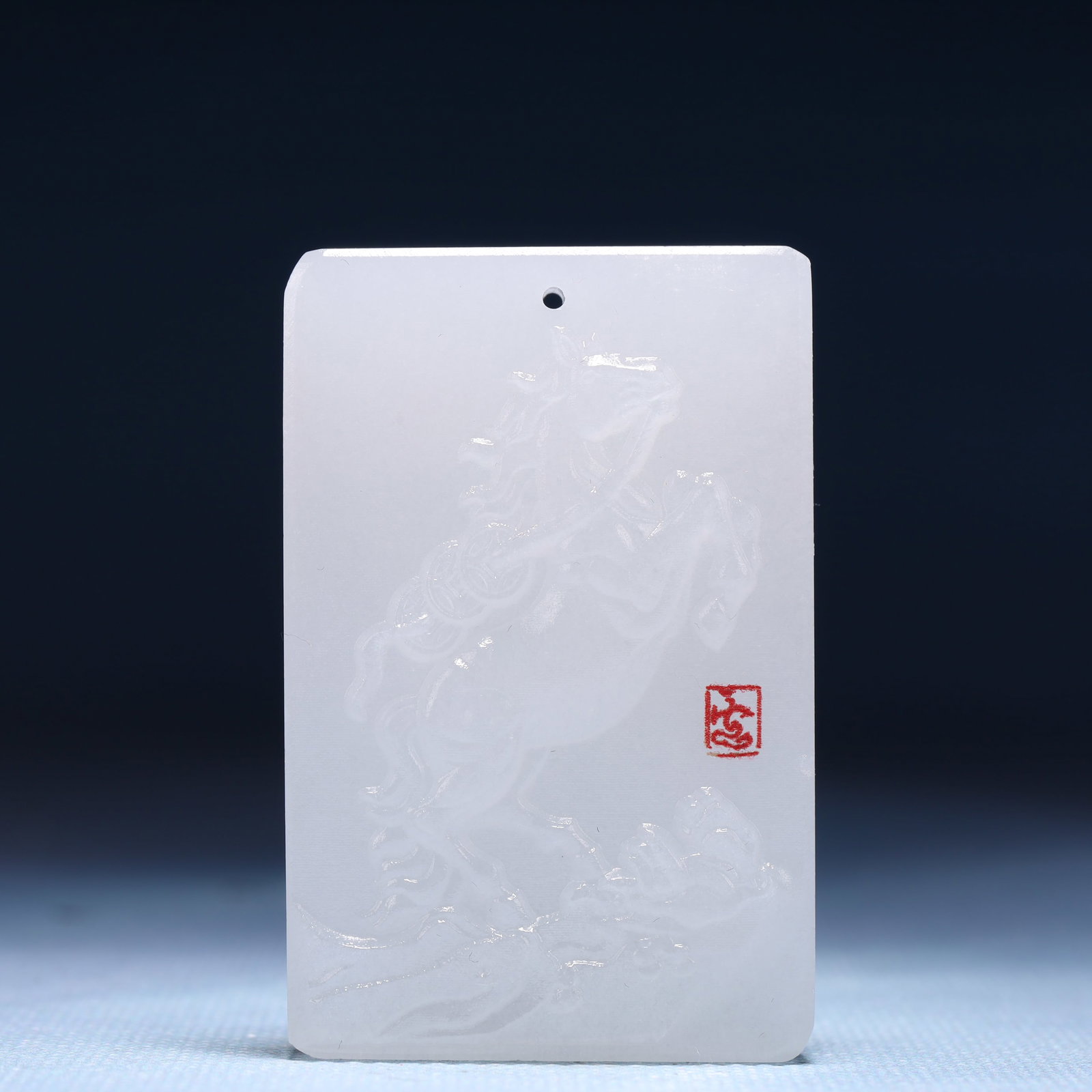 An Exquisite White Jade Horse Pattern Pendant: An Exquisite White Jade Horse Pattern Pendant,Size:1.6inx0.4inx2.4in,Weight:55g 白玉骏马纹牌