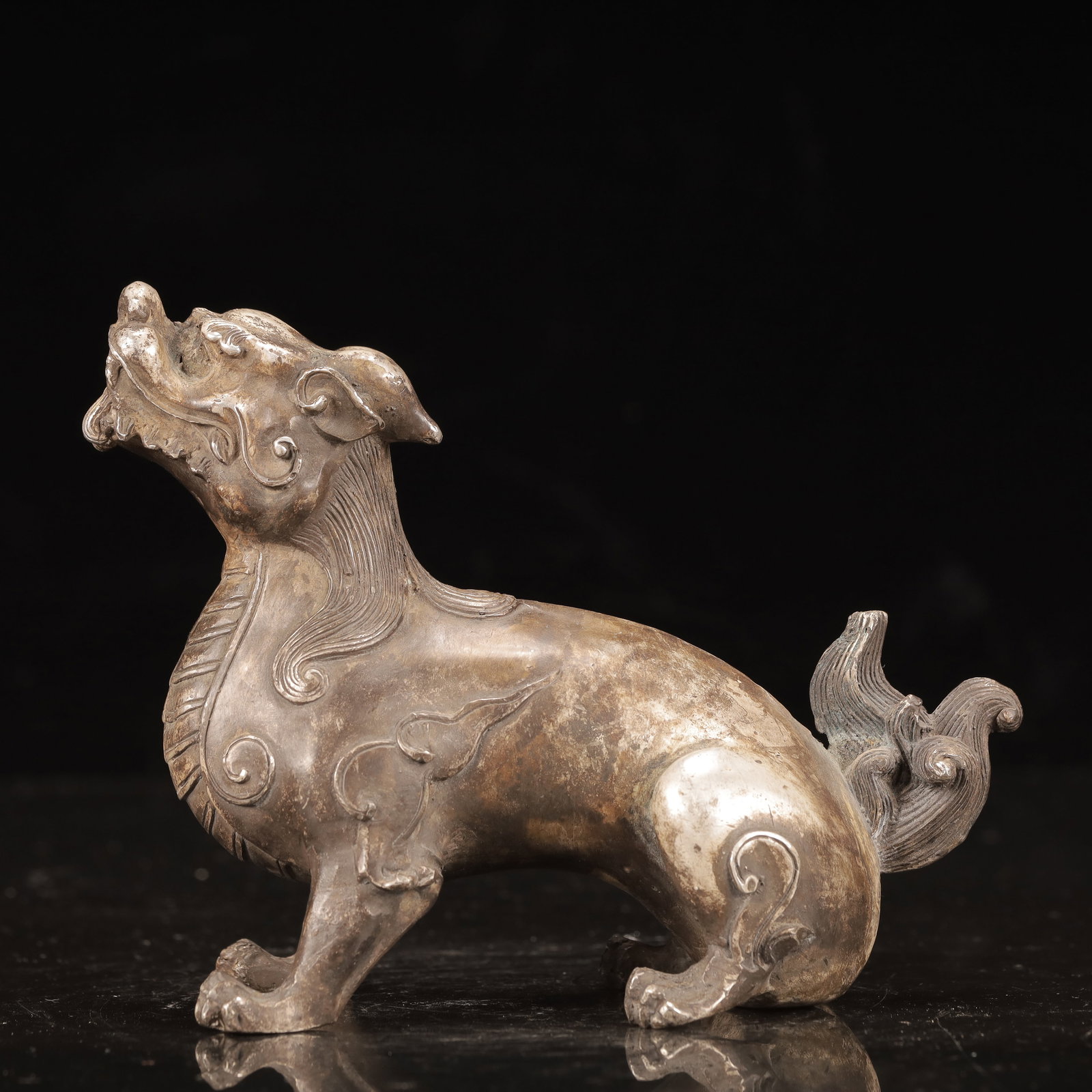 An Exquisite Silver-Plated Bronze Lion Ornament: An Exquisite Silver-Plated Bronze Lion Ornament,Qing Dynasty, China,Size:6.3inx2.8inx4.3in,Weight:750g 铜镀银狮子摆件,中国清代