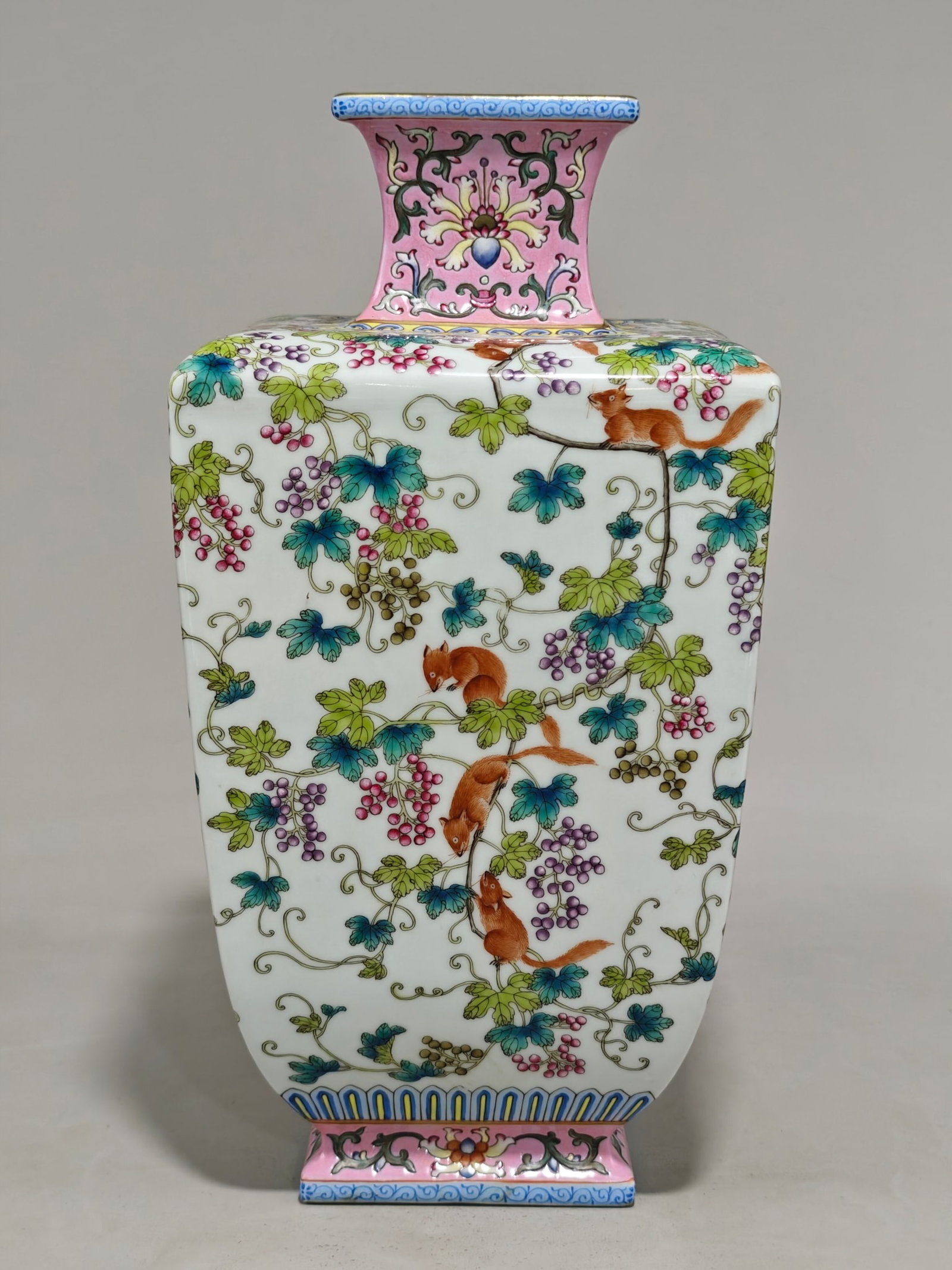 A Rare Famille-Rose Painted Gold Squirrel and Grapes Pattern Vase: A Rare Famille-Rose Painted Gold Squirrel and Grapes Pattern Vase,Qing Dynasty,China,Qianlong Six-character Mark,Size:12.2inx6.3in