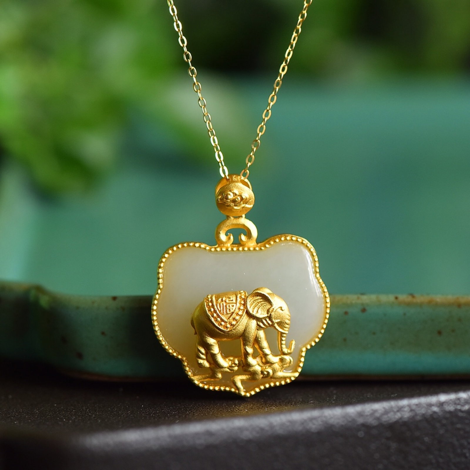 An Exquisite Sterling Silver-Gold Plated Inlaid White Jade Pendant: An Exquisite Sterling Silver-Gold Plated Inlaid White Jade Pendant 纯银镀金镶白玉吊坠