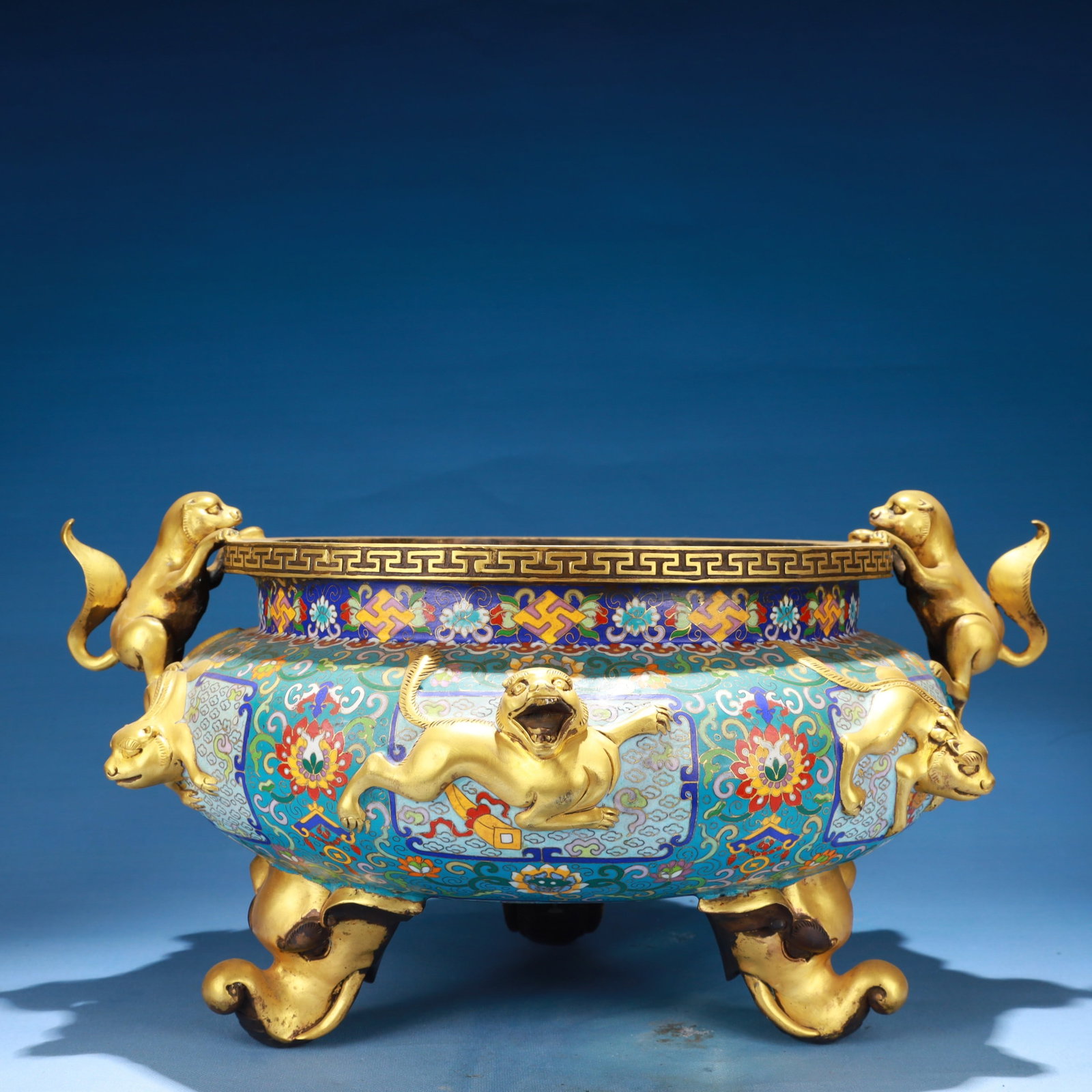 An Exquisite Cloisonne Lotus Pattern Double-Ears and Tripod Censer: An Exquisite Cloisonne Lotus Pattern Double-Ears and Tripod Censer,Qing Dynasty,China,Qianlong Six-character Mark,Size:17.3inx13.4inx9.1in,Weight:11000g 景泰蓝缠枝莲