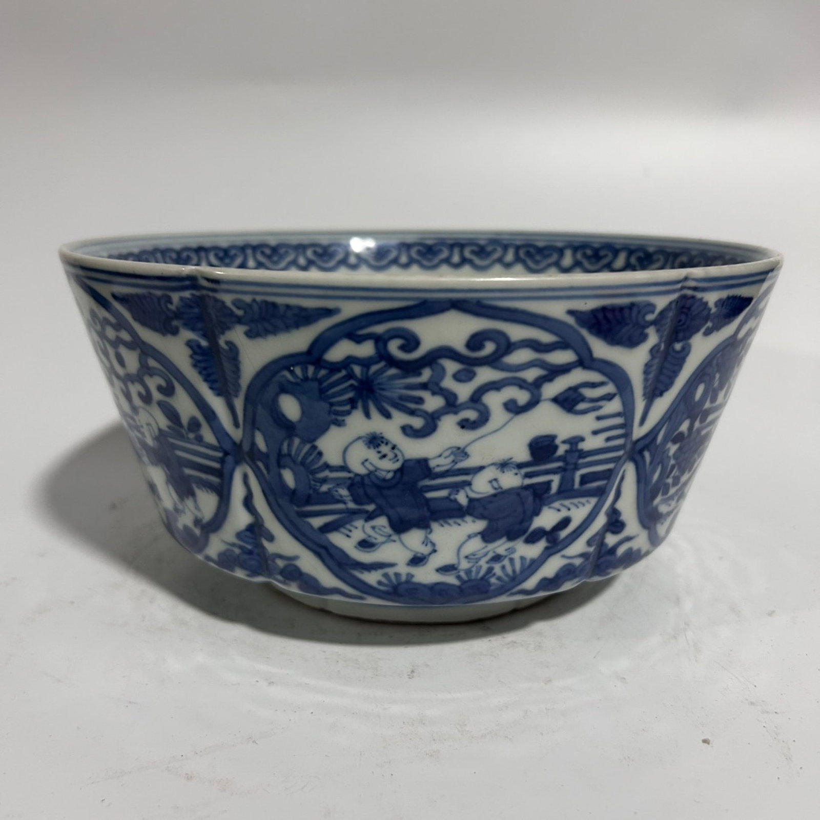 An Exquisite Blue and White Figure and Dragon Pattern Bowl (1 of 7)