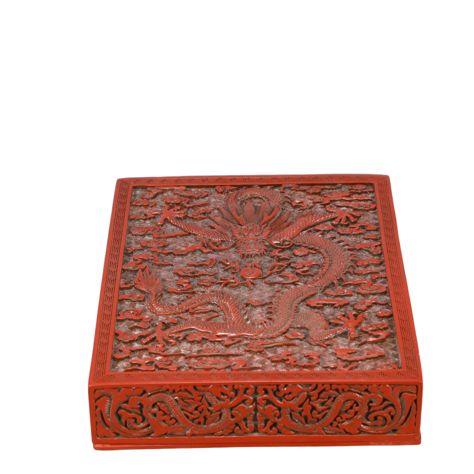 A Rare Carved Red Lacquer Dragon Pattern Cover Box: A Rare Carved Red Lacquer Dragon Pattern Cover Box,Qing Dynasty, China,Qianlong Six-character Mark,Size:12.6inx9.8inx2.6in,Weight:2900g 