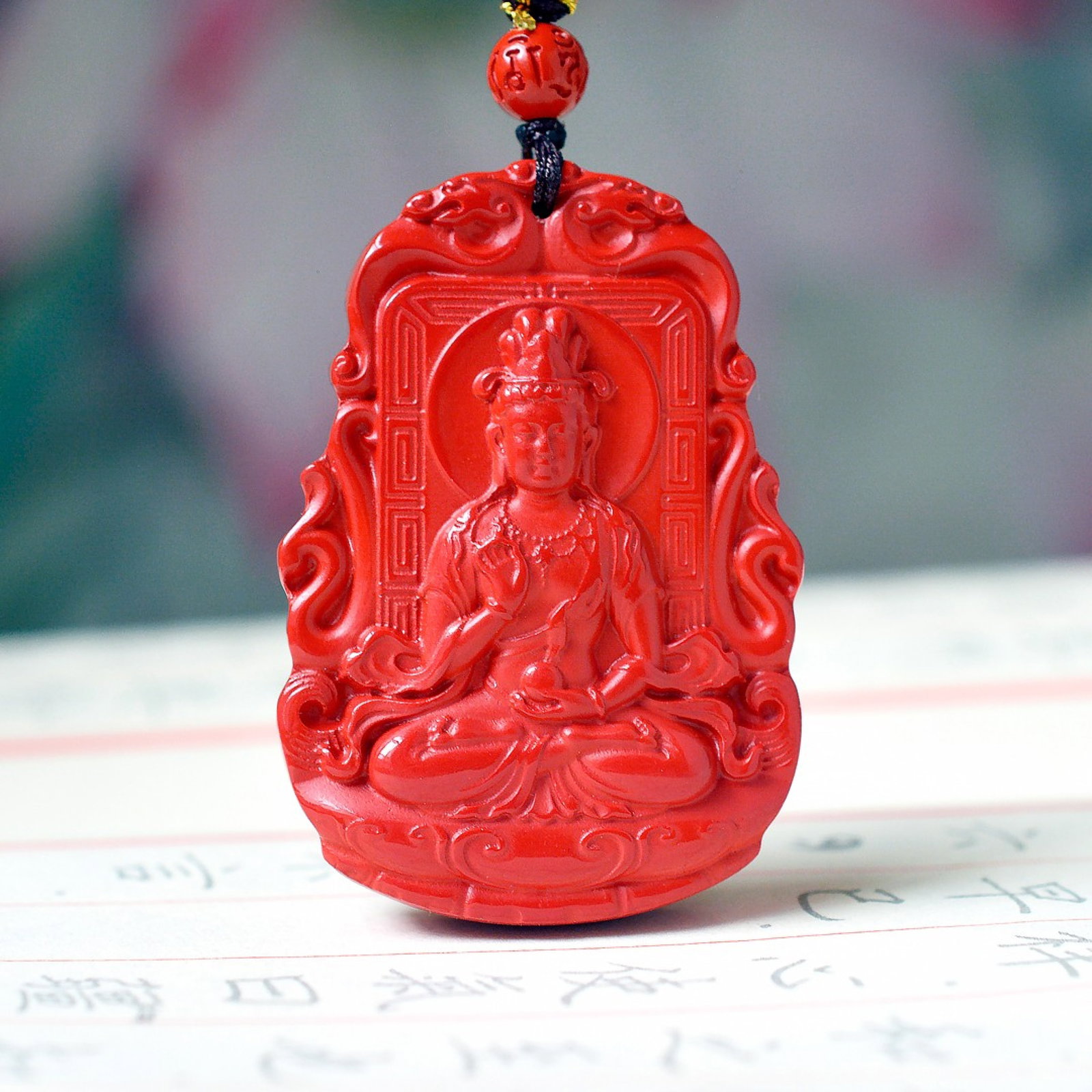 An Exquisite Cinnabar Avalokitesvara Pattern Pendant: An Exquisite Cinnabar Avalokitesvara Pattern Pendant,Size:36mmx51mm (寓意)吉祥招财喜庆、驱邪避凶、安神&#