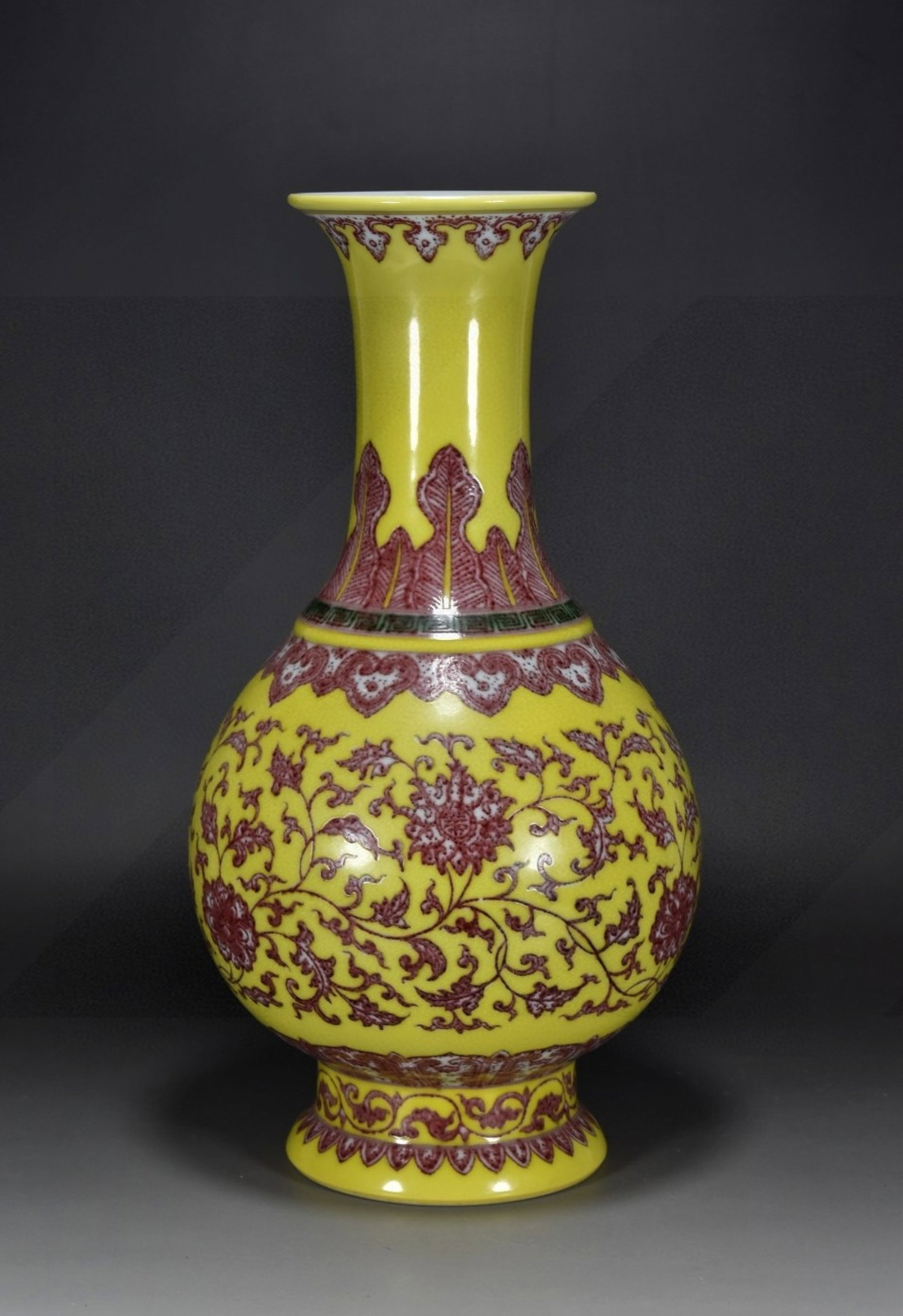 A Rare Guan yao Yellow Glazed Underglaze-Red Lotus Pattern Vase: A Rare Guan yao Yellow Glazed Underglaze-Red Lotus Pattern Vase,Qing Dynasty,China,Qianlong Six-character Mark,Size:13.8inx7.9in 官窑黄釉釉里红缠枝