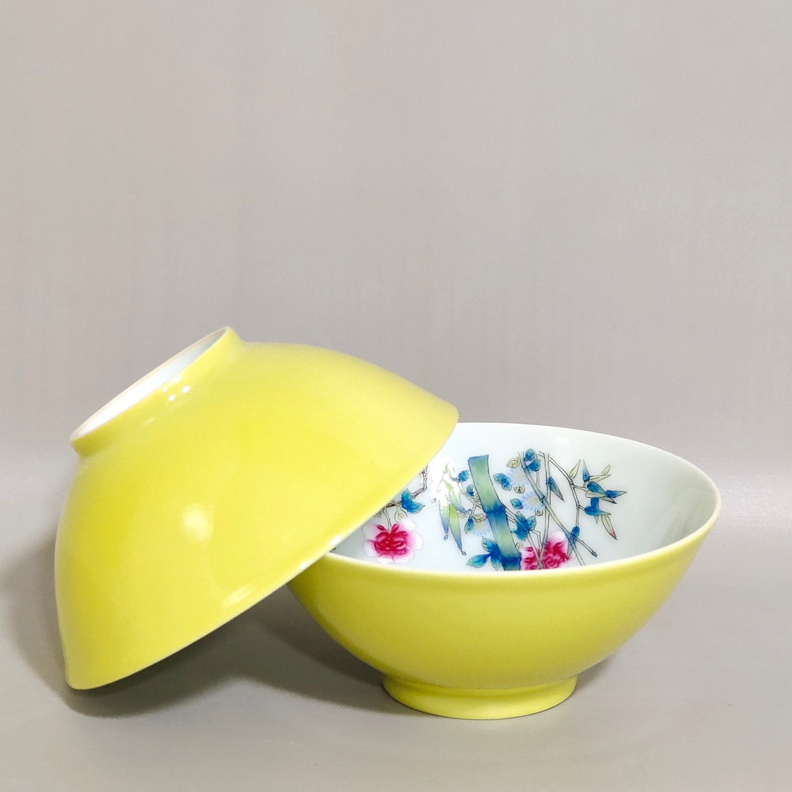 A Pair of Exquisite Yellow Glazed Famille-Rose Flower and Bird Pattern Cups: A Pair of Exquisite Yellow Glazed Famille-Rose Flower and Bird Pattern Cups,Qing Dynasty,China,Yongzheng Six-character Mark,Size:1.5inx3.5in 