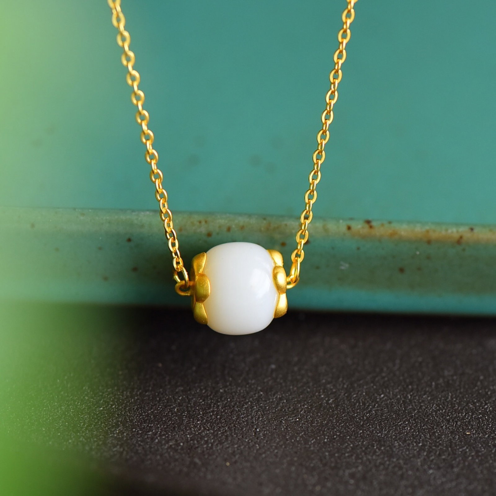 An Exquisite Sterling Silver-Gold Plated Inlaid White Jade Pendant: An Exquisite Sterling Silver-Gold Plated Inlaid White Jade Pendant 纯银镀金镶白玉吊坠