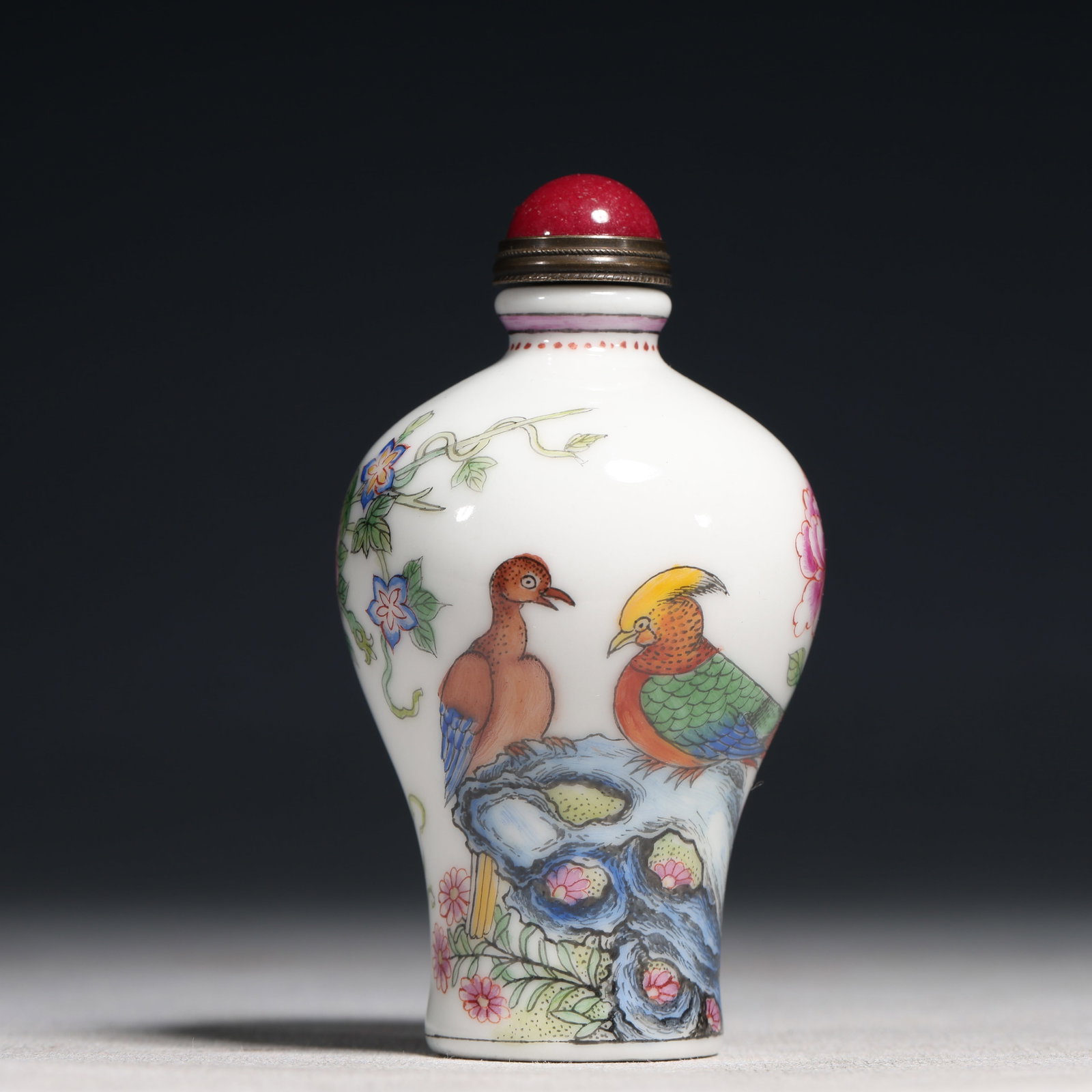 An Exquisite Painted Enamel Flower Pattern Porcelain Snuff Bottle: An Exquisite Painted Enamel Flower Pattern Porcelain Snuff Bottle,Qing Dynasty,China,Kangxi Four-character Mark,Size:2inx3.3in 瓷胎画珐琅彩花卉纹&