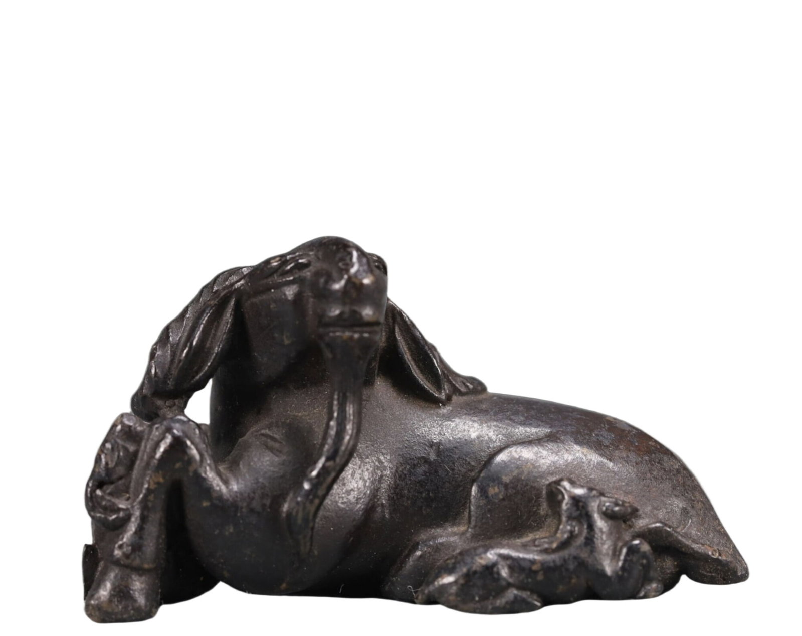 An Exquisite Bronze Auspicious Beast Ornament: An Exquisite Bronze Auspicious Beast Ornament,Qing Dynasty, China,Size:2.8inx1.5inx1.6in Weight:200g 铜瑞兽摆件,中国清代