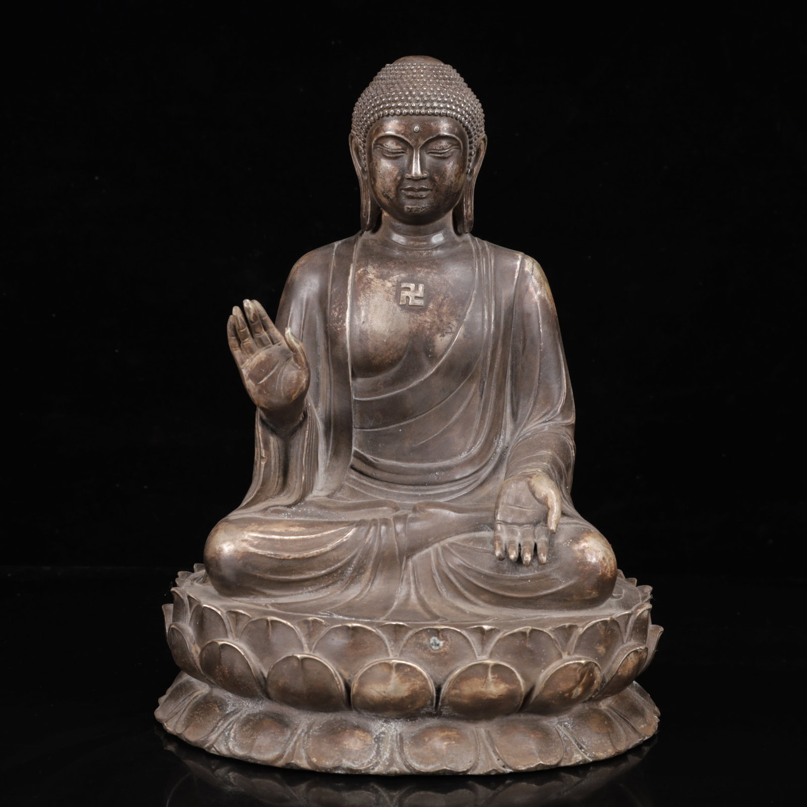 An Exquisite Silver-Plated Bronze Statue of Sakyamuni: An Exquisite Silver-Plated Bronze Statue of Sakyamuni,Qing Dynasty,China,Qianlong Four-Character Mark,Size:8.7inx12.2in,Weight:3100g