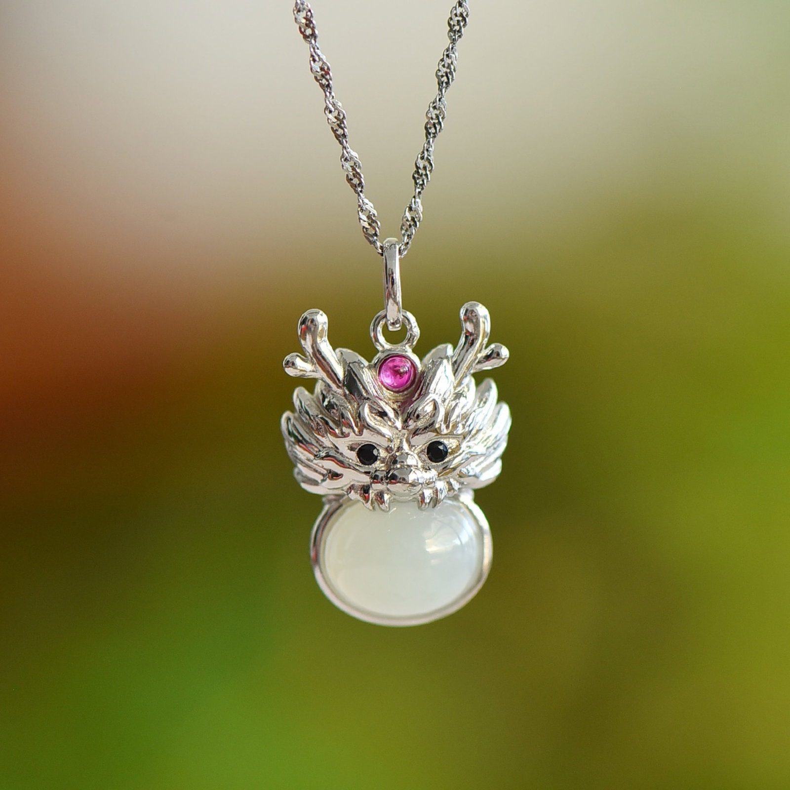An Exquisite Sterling Silver Inlaid White Jade Pendant: An Exquisite Sterling Silver Inlaid White Jade Pendant,Size:8mmx10mm 纯银镶白玉吊坠