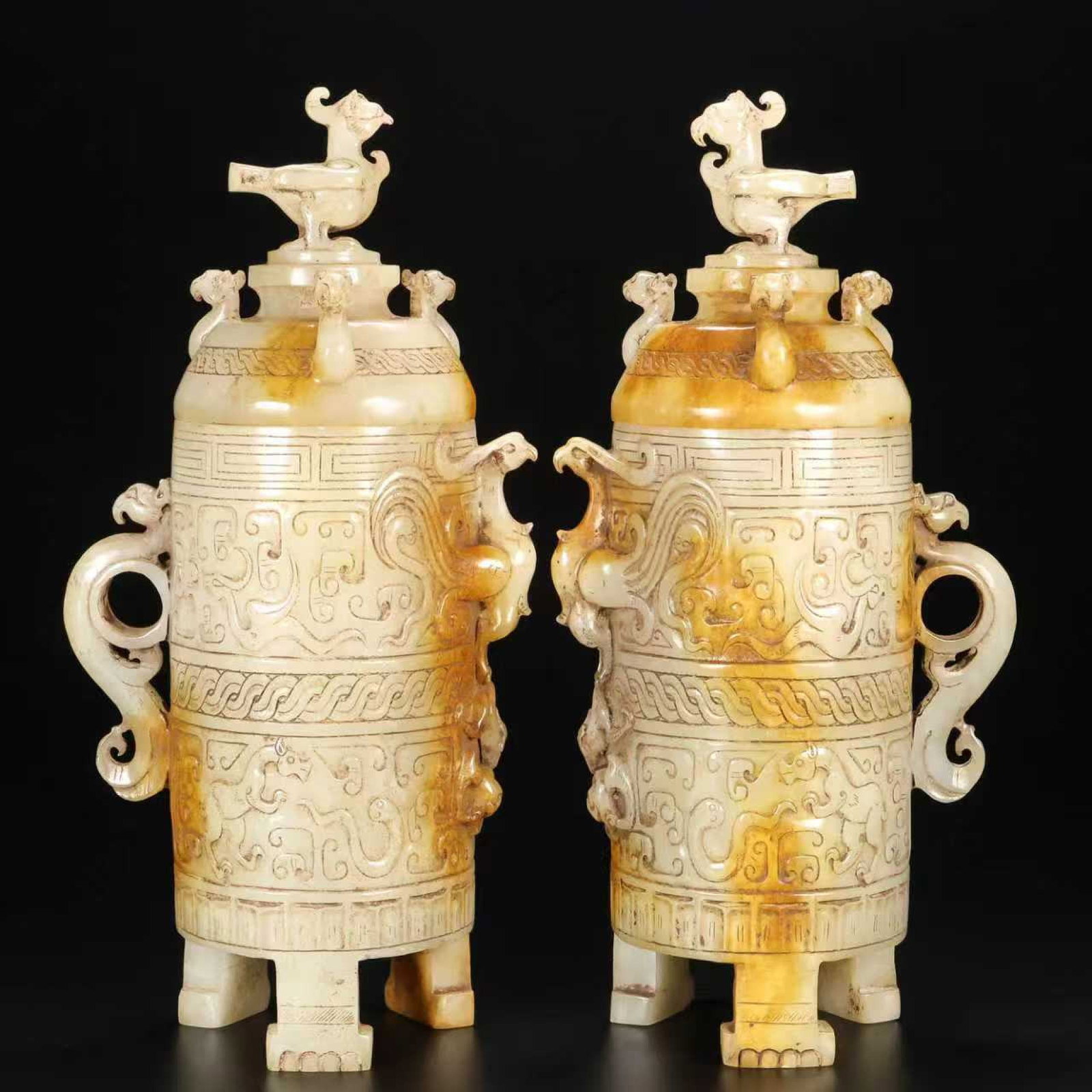 A Pair of Exquisite White Jade Auspicious Beast Pattern Phoenix-Ears Tripod Cups: A Pair of Exquisite White Jade Auspicious Beast Pattern Phoenix-Ears Tripod Cups,Qing Dynasty,China,Size:4.3inx2.8inx8.3in,Weight:1271g