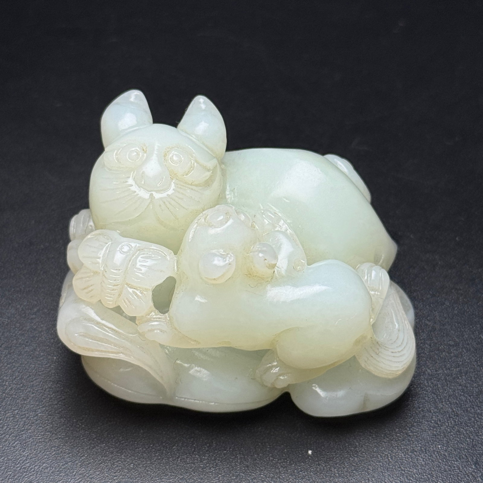 An Exquisite White Jade Butterfly Pattern Cat Hand Piece (1 of 7)