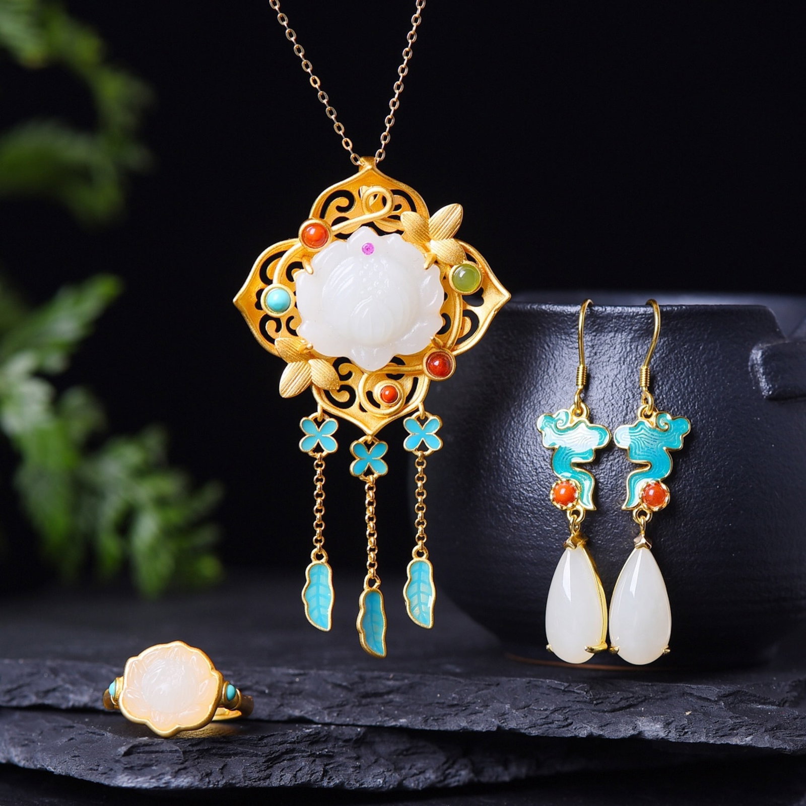 A Set of Fine Sterling Silver-Gold Plated Inlaid White Jade Jewelrys: A Set of Fine Sterling Silver-Gold Plated Inlaid White Jade Jewelrys,Size:(Pendant)20mmx21mm,(Earrings)8mmx16mm,(Ring)11mmx12mm 一套纯银镀金镶白玉