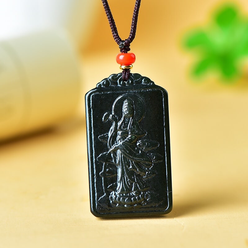 An Exquisite Sapphire Avalokitesvara Fish Pattern Pendant: An Exquisite Sapphire Avalokitesvara Fish Pattern Pendant,Size:30mmx51mm 寓意:寓意吉祥 玉脂温润 青玉观音像(