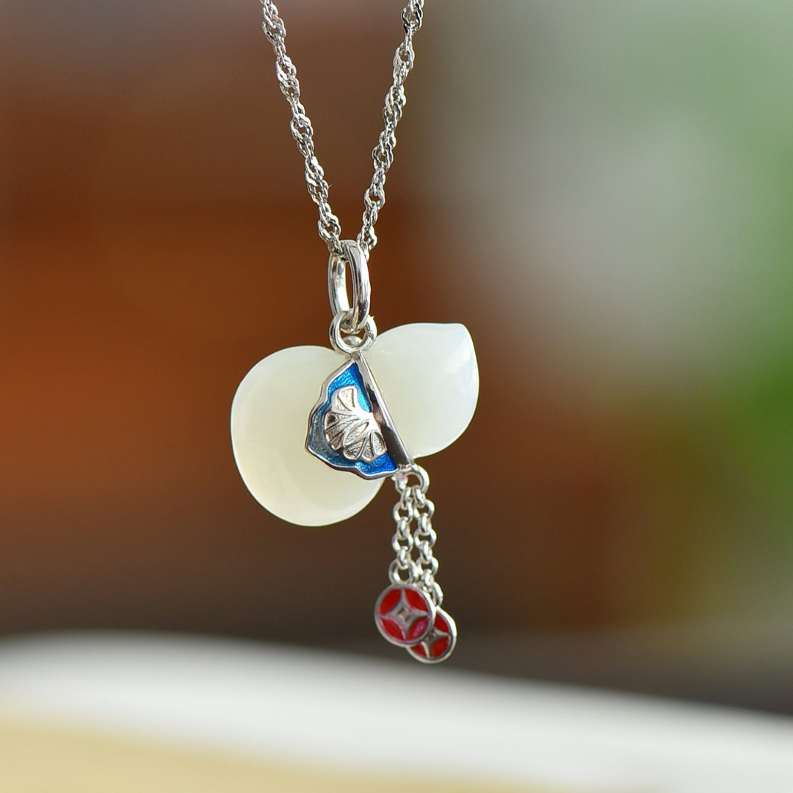 An Exquisite Sterling Silver Inlaid White Jade Gourd Pendant: An Exquisite Sterling Silver Inlaid White Jade Gourd Pendant 纯银镶白玉葫芦吊坠