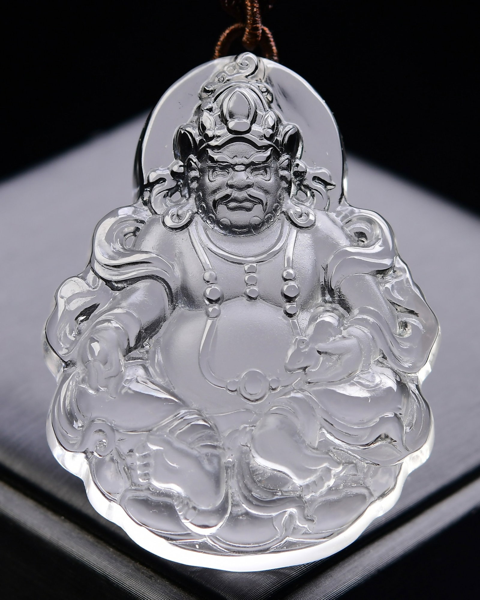 An Exquisite Crystal Statue of Mammon Pendant: An Exquisite Crystal Statue of Mammon Pendant,Size:60mmx47mmx15mm,Weight:70g 水晶财神像吊坠
