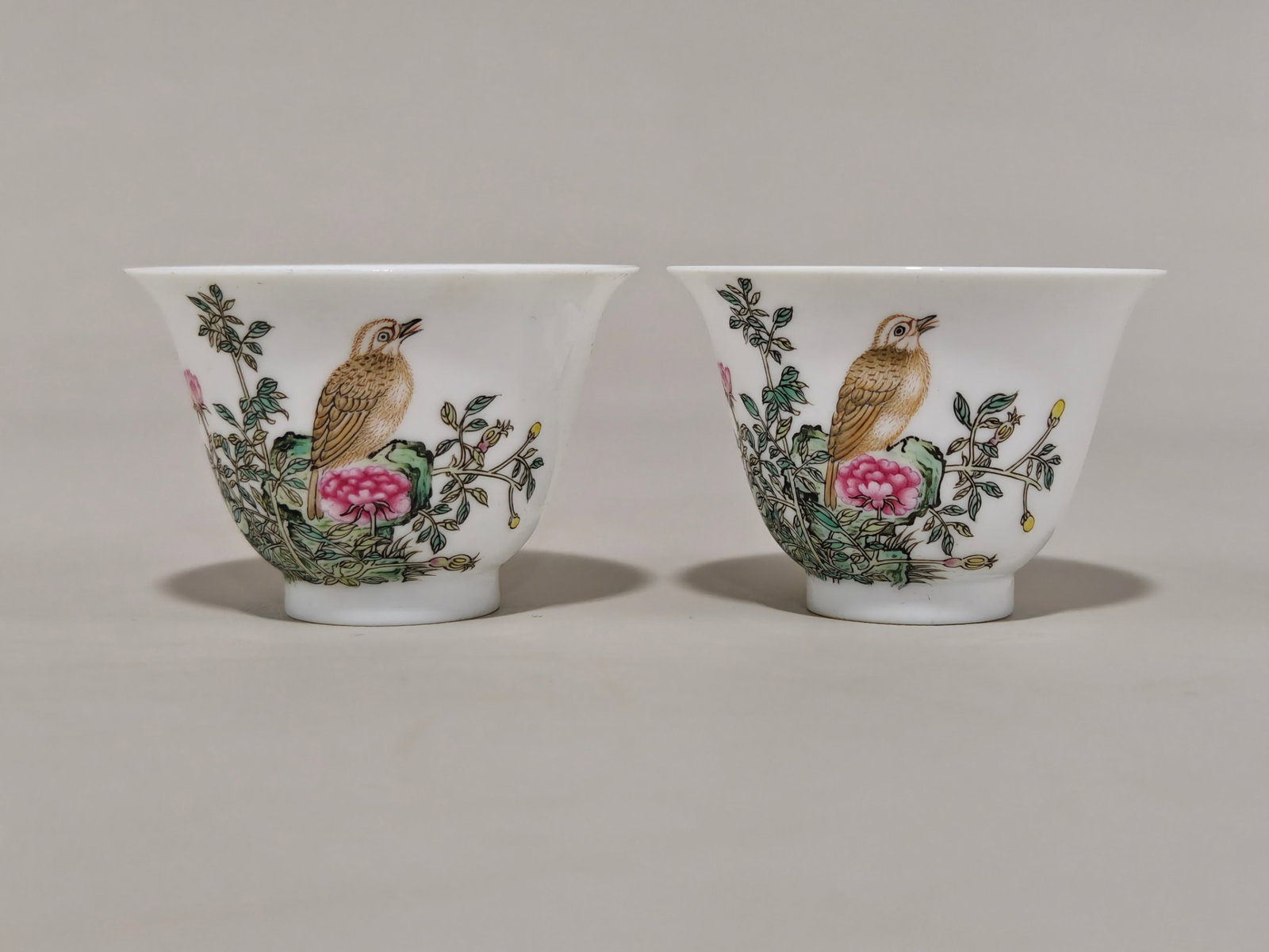 A Pair of Exquisite Enamel Flower and Bird Pattern Cups,With Poem: A Pair of Exquisite Enamel Flower and Bird Pattern Cups,With Poem,Qing Dynasty,China,Yongzheng Four-character Mark,Size:1.8inx2.7in