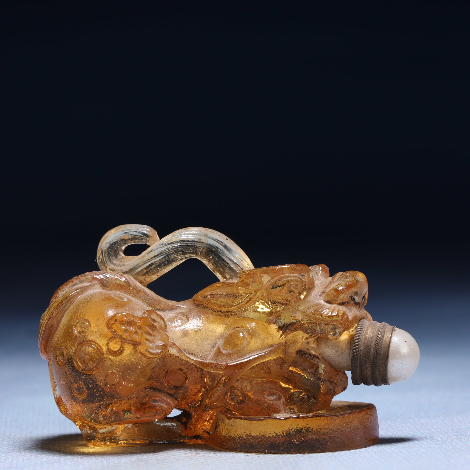 An Exquisite Crystal Auspicious Beast Snuff Bottle: An Exquisite Crystal Auspicious Beast Snuff Bottle,Qing Dynasty,China,Size:2.4inx1.2inx1.6in,Weight:82g 水晶瑞兽鼻烟壶,中国清代