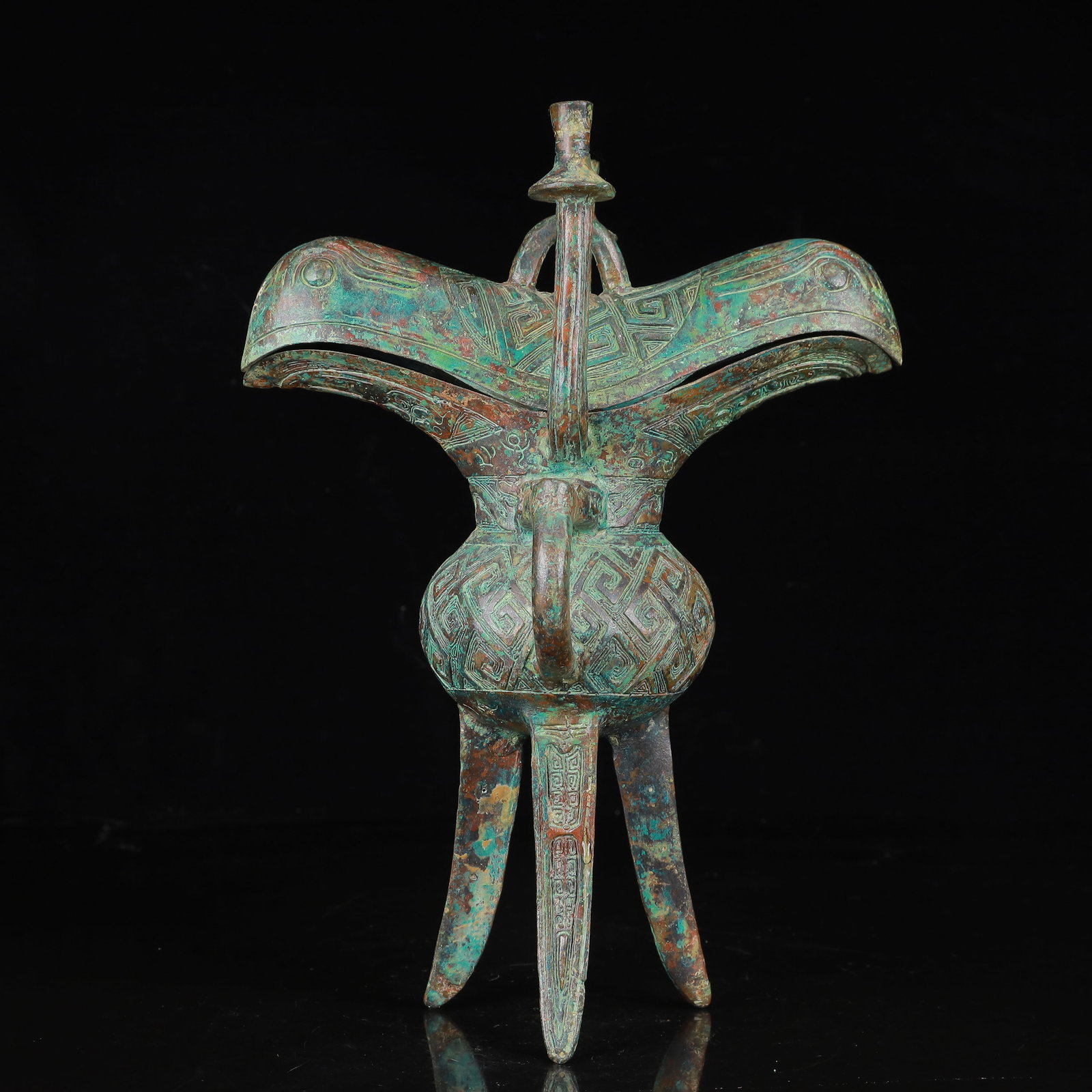 An Archaic Bronze Double-Ears and Tripod Phoenix Cup: An Archaic Bronze Double-Ears and Tripod Phoenix Cup,the Warring States Period in China,Size:7.9inx8.3inx10.6in,Weight:1300g 青铜双耳三足凤杯,中&#