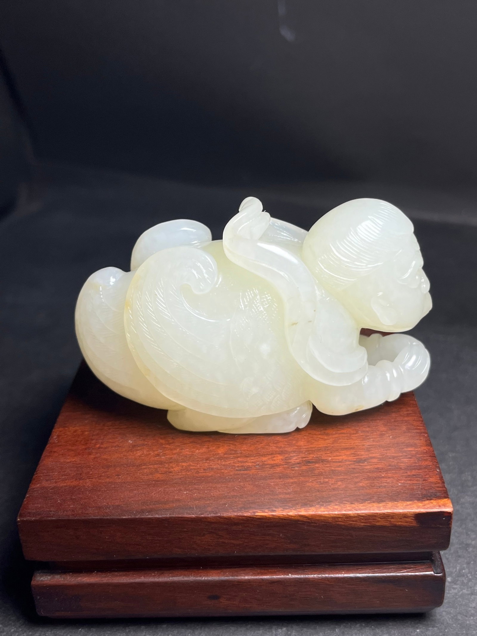 An Exquisite White Jade Figure Hand Piece: An Exquisite White Jade Figure Hand Piece,Qing Dynasty,China,Size:73mmx33mmx48mm,Weight:155g 白玉人物手把件,中国清代