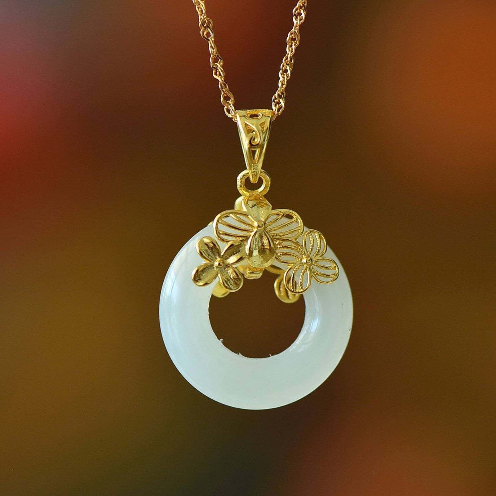 An Exquisite Sterling Silver-Gold Plated Inlaid White Jade Pendant: An Exquisite Sterling Silver-Gold Plated Inlaid White Jade Pendant 纯银镀金镶白玉吊坠