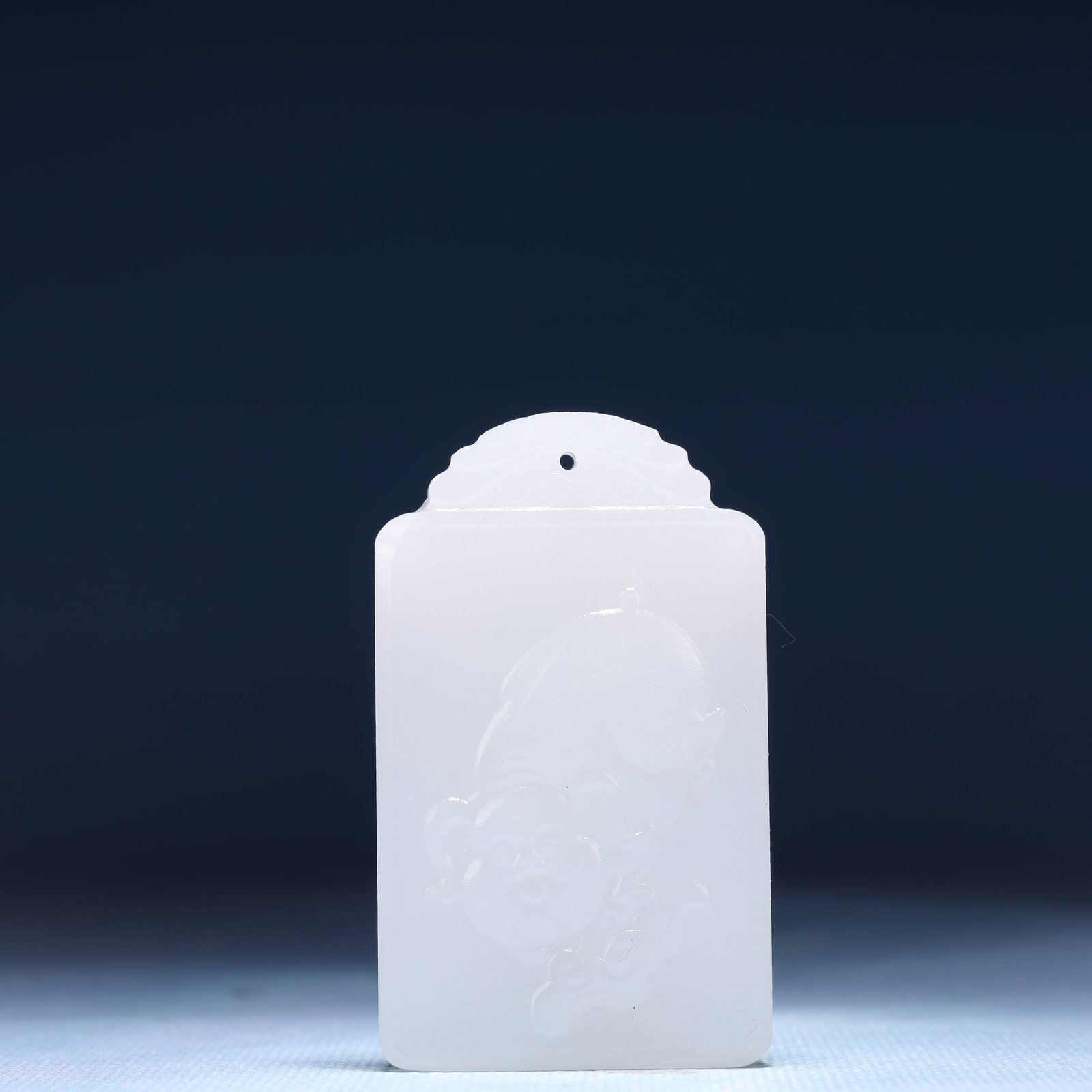 An Exquisite White Jade Pig Pattern Pendant: An Exquisite White Jade Pig Pattern Pendant,Size:1.6inx0.4inx2.4in,Weight:49g 白玉猪纹牌