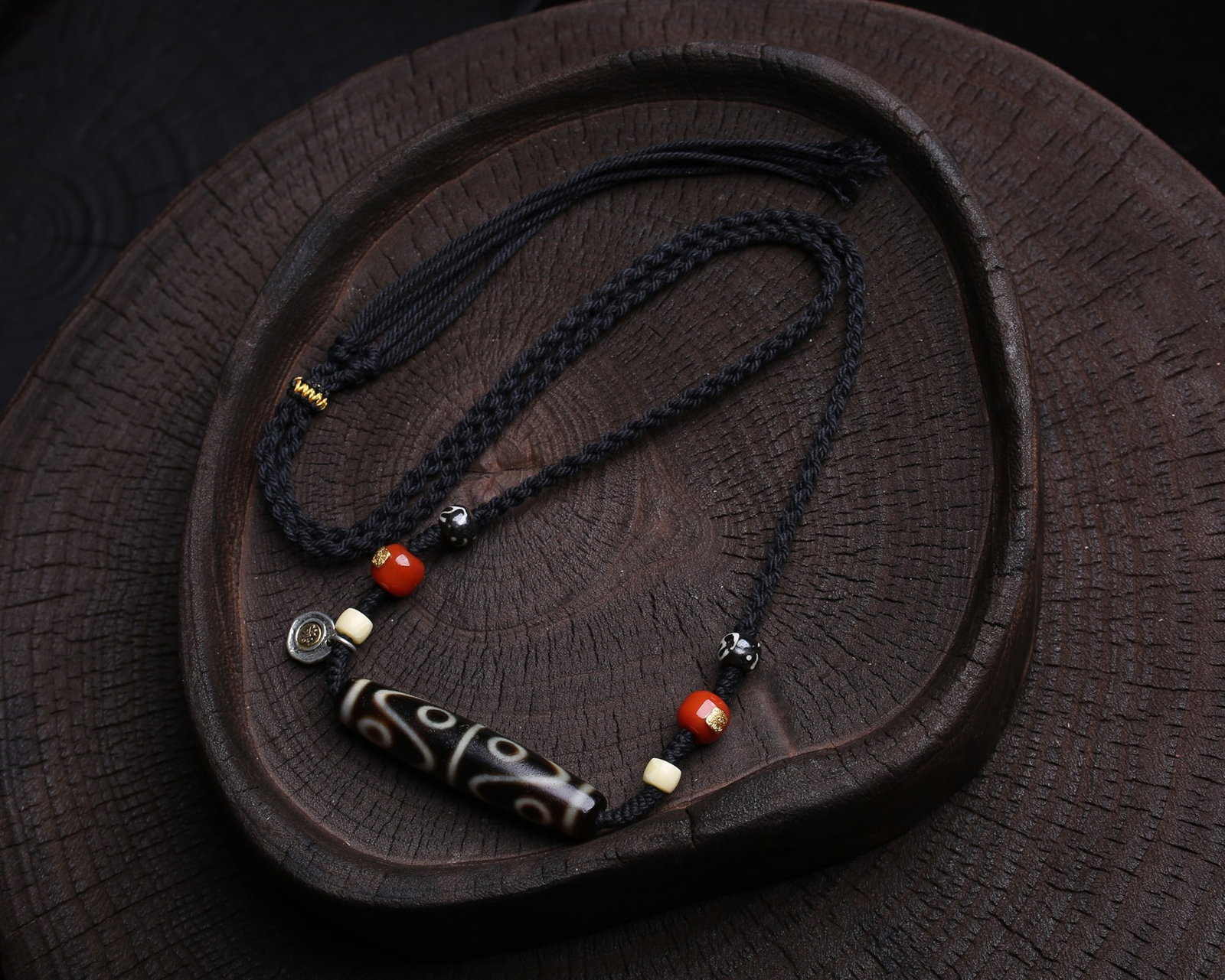 An Exquisite Eight Eyes Dzi Bead Pendant: An Exquisite Eight Eyes Dzi Bead Pendant,Size:56.5mmx13mm,Weight:23.2g 八眼天珠挂件