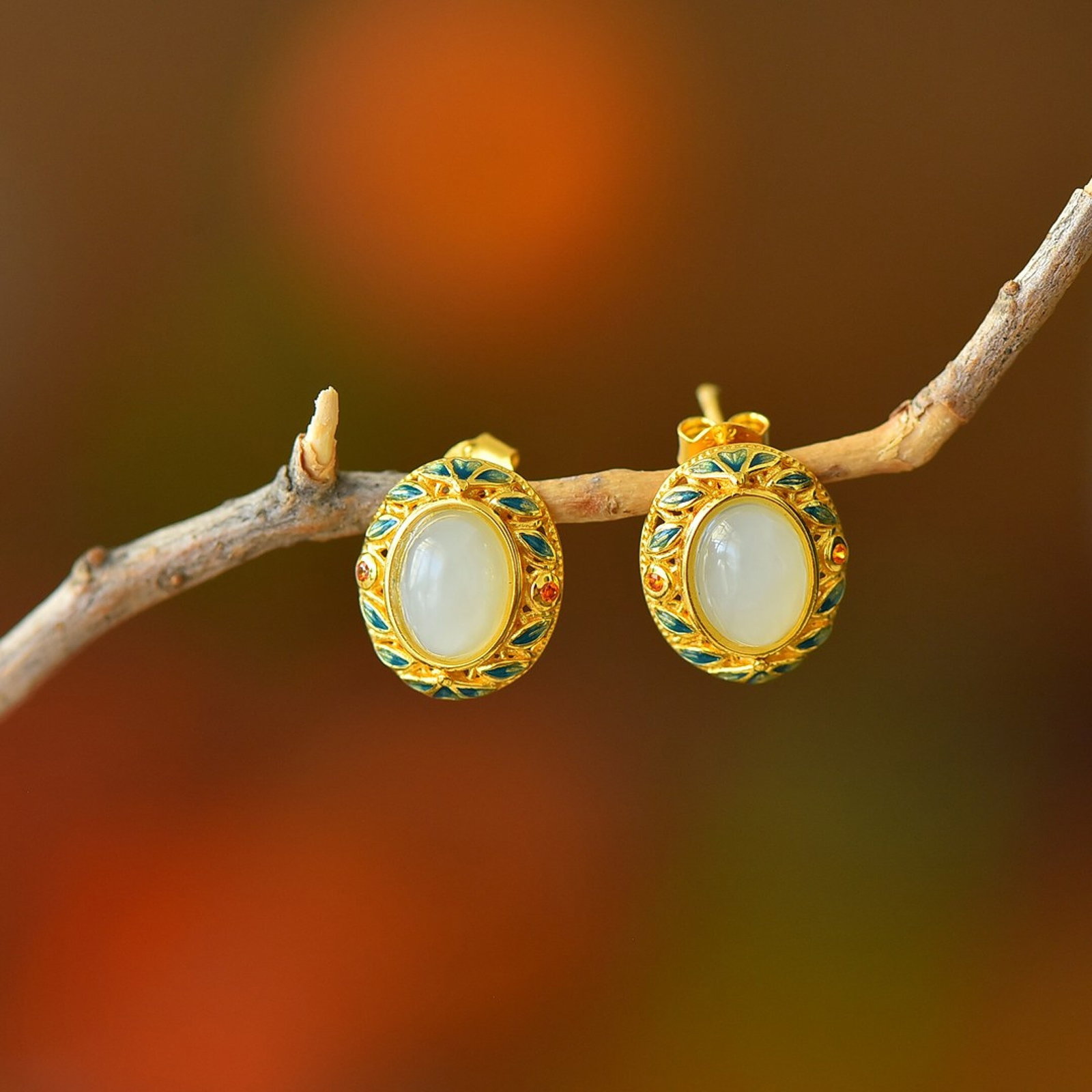 A Pair of Exquisite Sterling Silver-Gold Plated Inlaid White Jade Earrings: A Pair of Exquisite Sterling Silver-Gold Plated Inlaid White Jade Earrings 一对纯银镀金镶白玉耳环