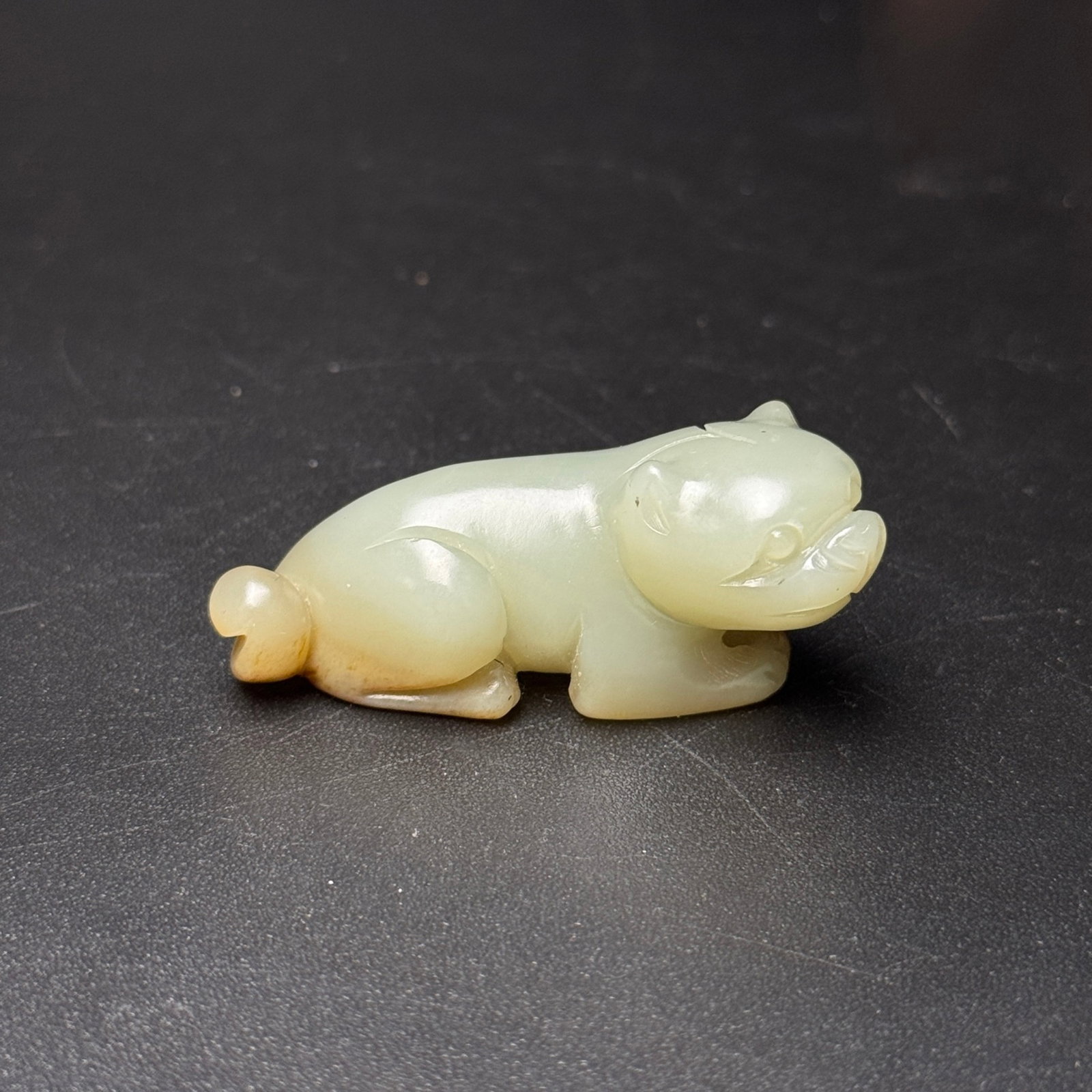 An Exquisite White Jade Tiger Pendant: An Exquisite White Jade Tiger Pendant,Qing Dynasty,China,Size:51mmx17mmx23mm,Weight:28g 白玉老虎挂件,中国清代