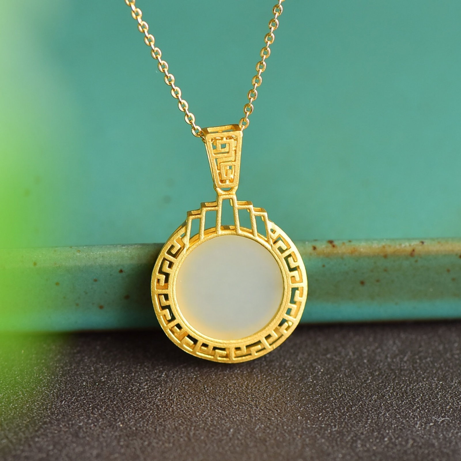 An Exquisite Sterling Silver-Gold Plated Inlaid White Jade Pendant: An Exquisite Sterling Silver-Gold Plated Inlaid White Jade Pendant 纯银镀金镶白玉吊坠
