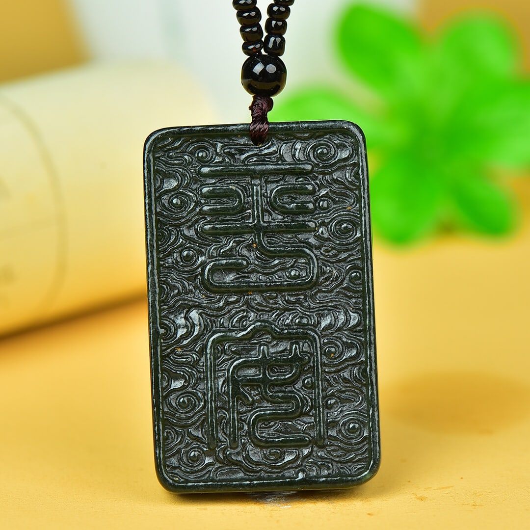An Exquisite Sapphire Auspicious Cloud Pattern Pendant (1 of 5)