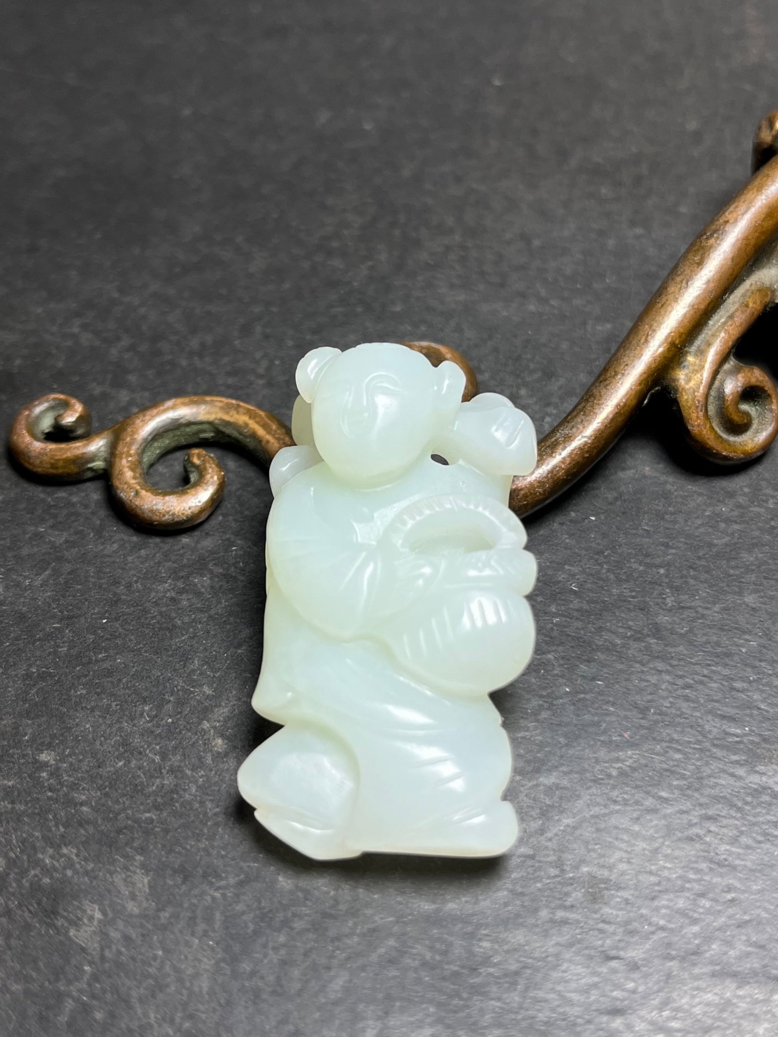 An Exquisite White Jade Figure Pendant: An Exquisite White Jade Figure Pendant,Qing Dynasty,China,Size:24mmx15mmx45mm,Weight:22g 白玉人物挂件,中国清代