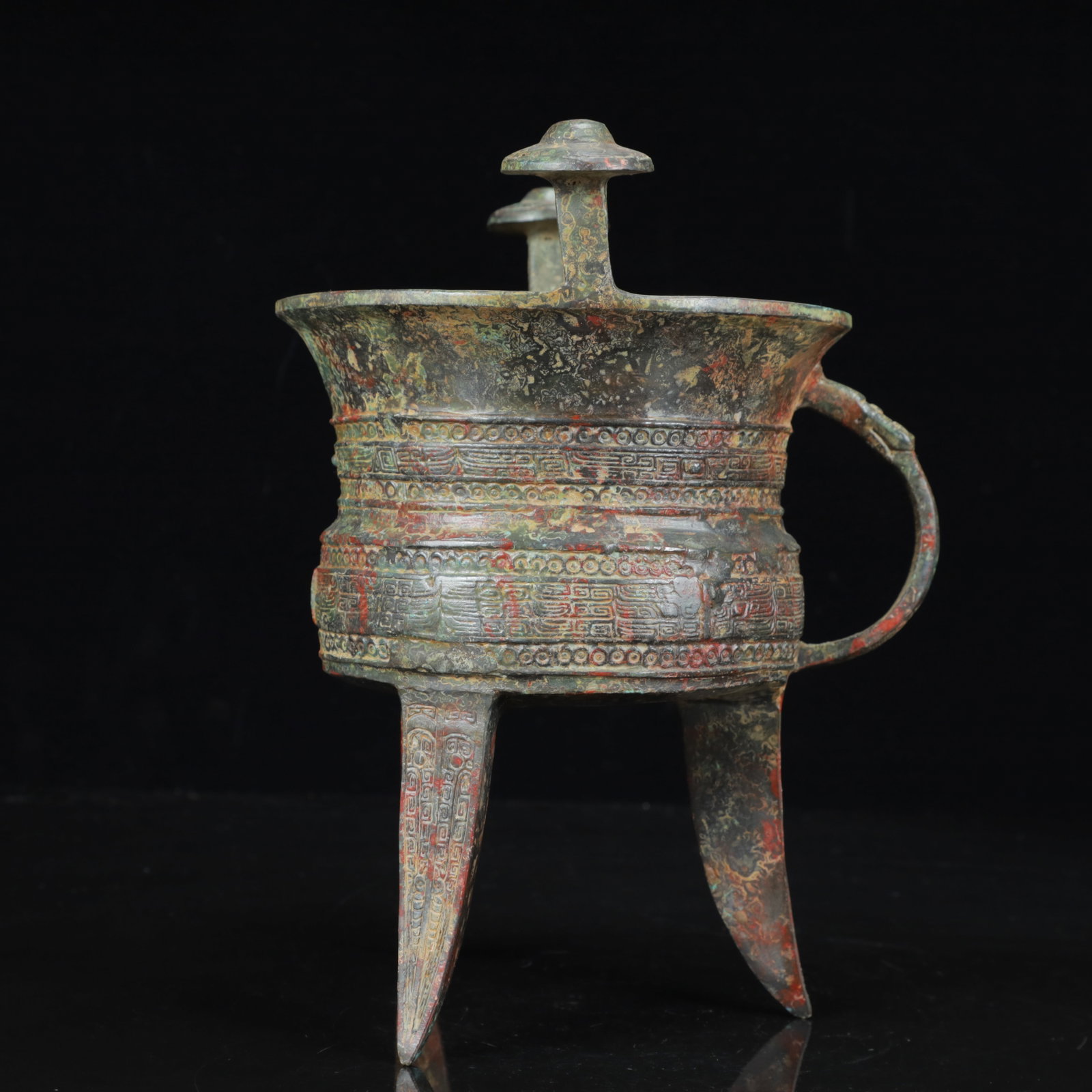 An Archaic Bronze Beast-Face Pattern Double-Ears and Tripod Censer: An Archaic Bronze Beast-Face Pattern Double-Ears and Tripod Censer,the Warring States Period in China,Size:7.9inx10.2inx9.4in,Weight:1700g 青铜兽面纹双耳Ç
