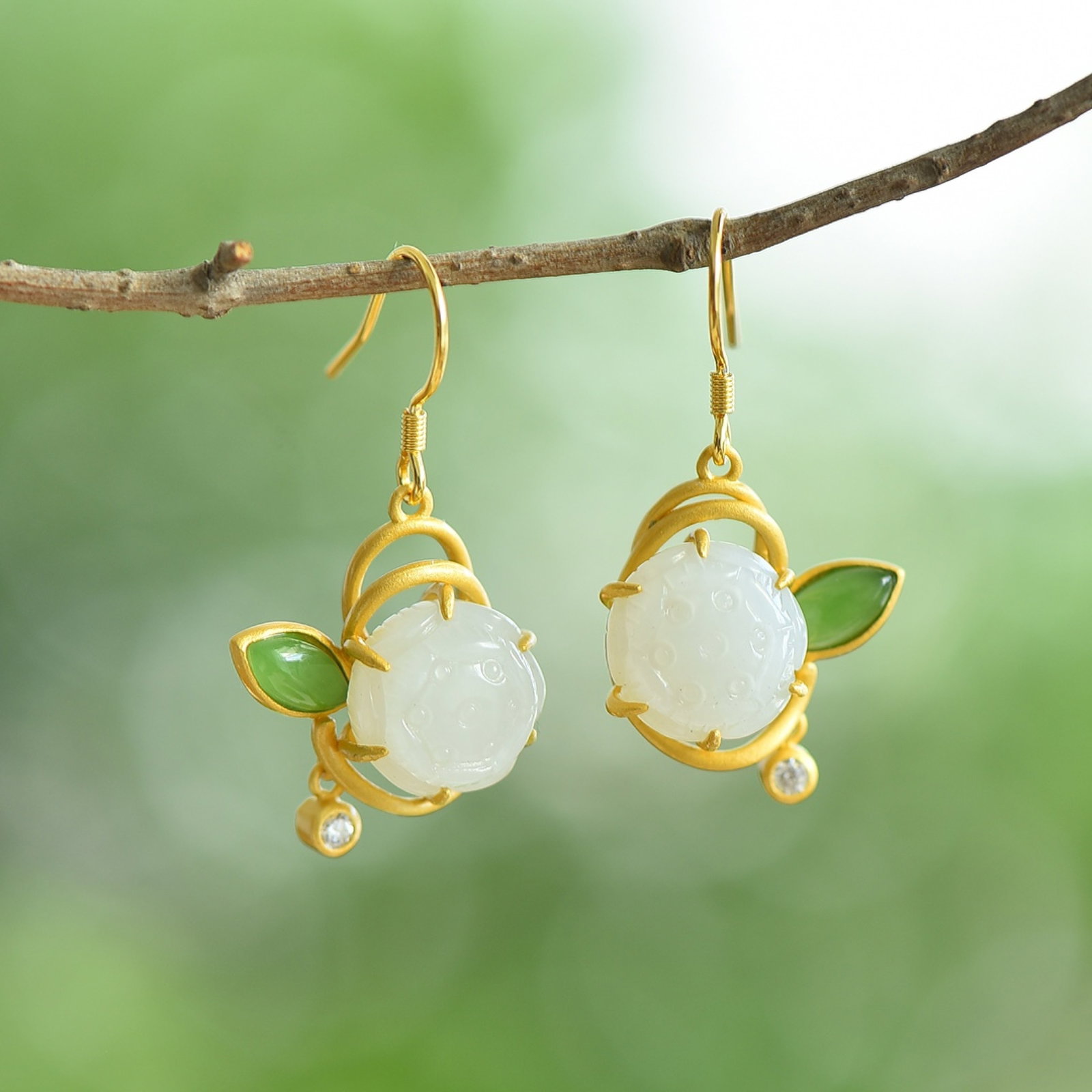 A Pair of Exquisite Sterling Silver-Gold Plated Inlaid White Jade Earrings: A Pair of Exquisite Sterling Silver-Gold Plated Inlaid White Jade Earrings 一对纯银镀金镶白玉耳环