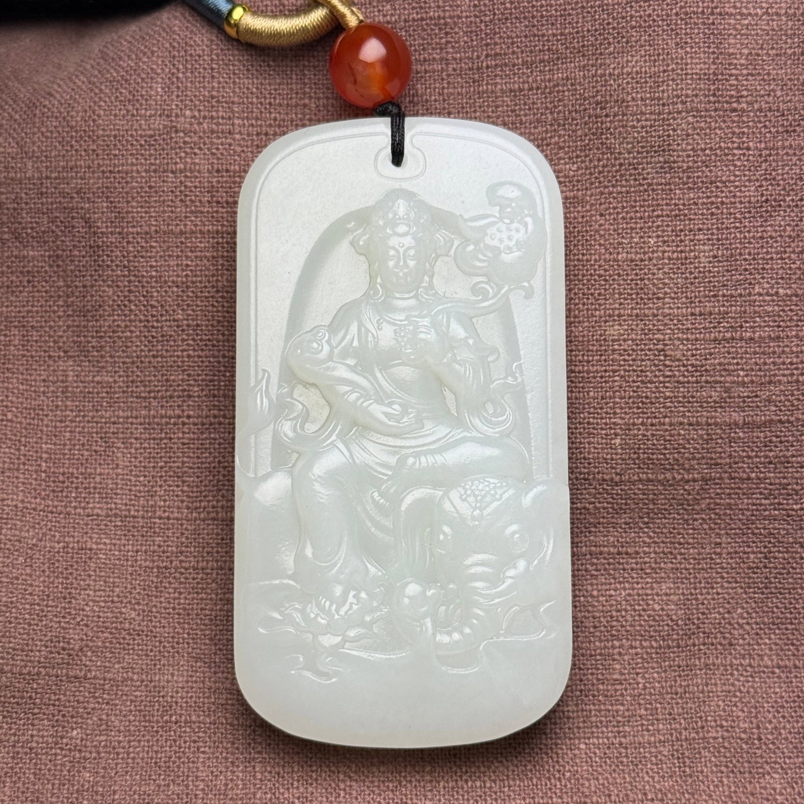 An Exquisite White Jade Statue of Samantabhadra Pattern Pendant: An Exquisite White Jade Statue of Samantabhadra Pattern Pendant,Qing Dynasty,China,Size:76mmx40mmx12mm,Weight:93g 白玉普贤菩萨像纹挂件,È