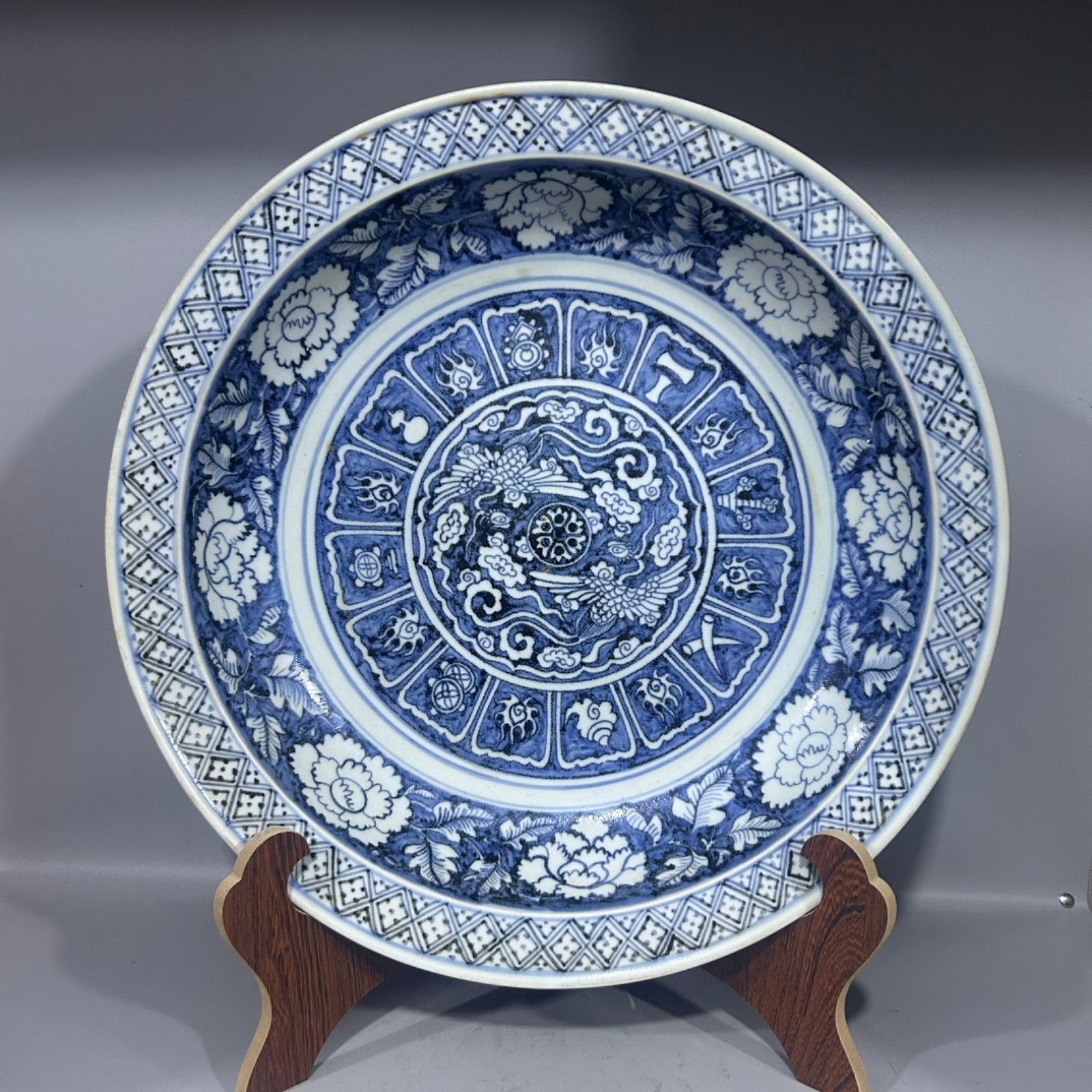 A Huge Blue and White Peony and Phoenix Pattern Plate: A Huge Blue and White Peony and Phoenix Pattern Plate,Qing Dynasty,China,Size:17.5inx3.3in 青花牡丹凤纹盘,中国清代