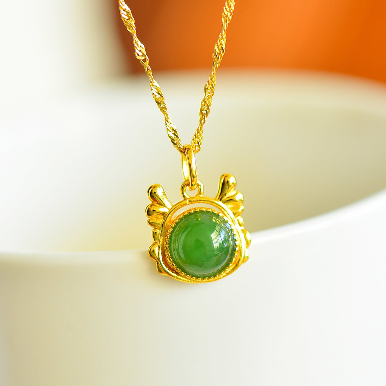 An Exquisite Sterling Silver-Gold Plated Inlaid Jasper Pendant: Sterling Silver-Gold Plated Inlaid Jasper Pendant , Size :8mmx10mm 纯银镀金镶碧玉吊坠,尺寸:8mmx10mm