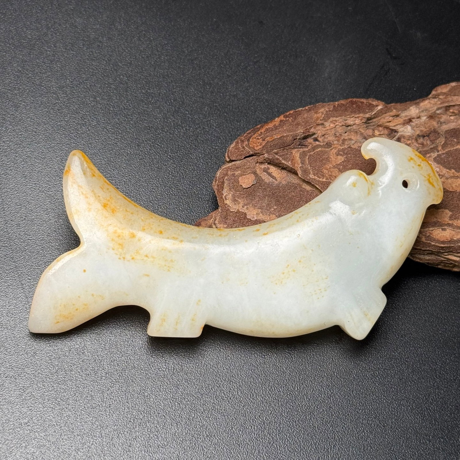 An Exquisite White Jade Fish Pendant: An Exquisite White Jade Fish Pendant,Qing Dynasty,China,Size:96mmx48mmx12mm,Weight:69g 白玉鱼挂件,中国清代