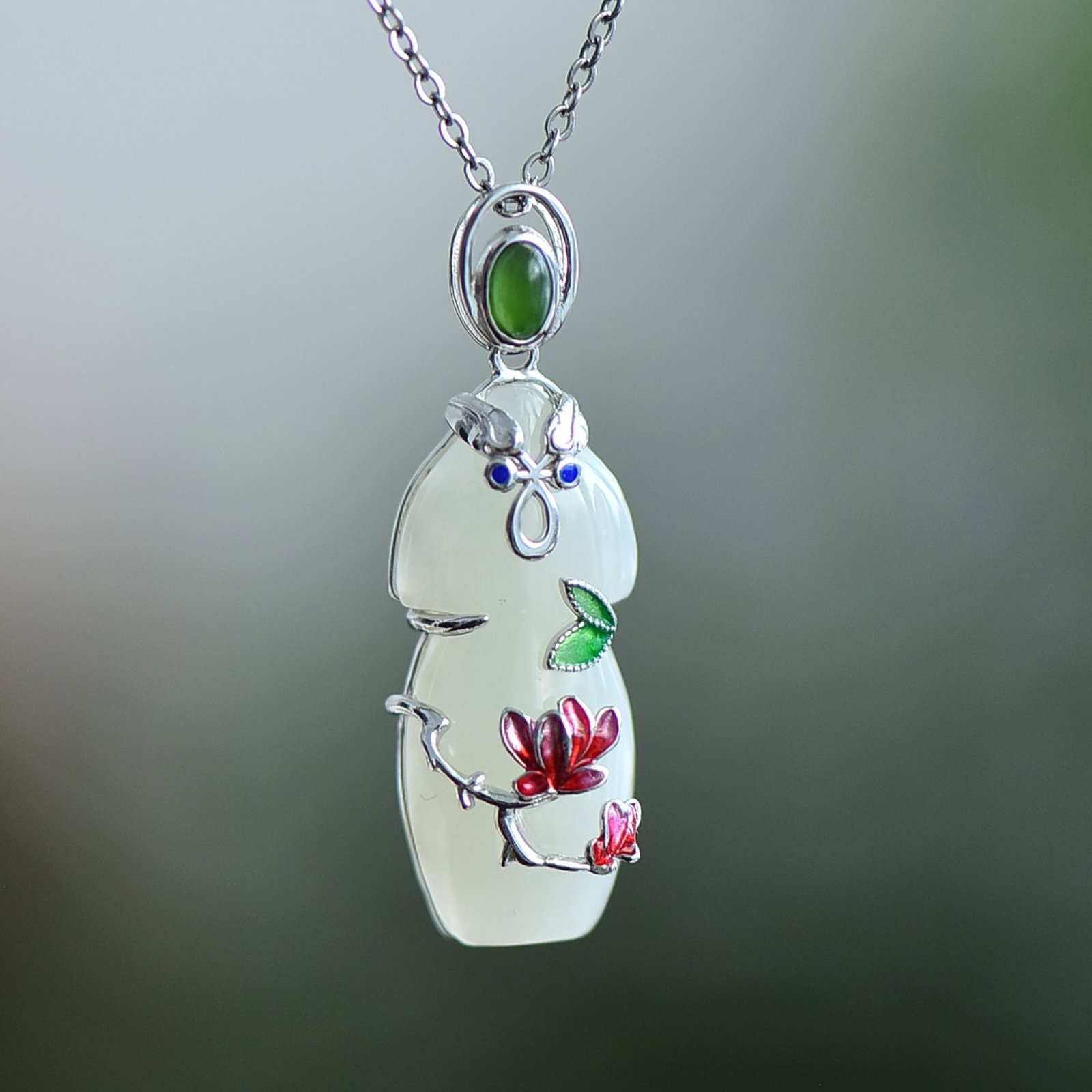An Exquisite Sterling Silver Inlaid White Jade Pendant: An Exquisite Sterling Silver Inlaid White Jade Pendant,Size:14mmx31mm 纯银镶白玉吊坠