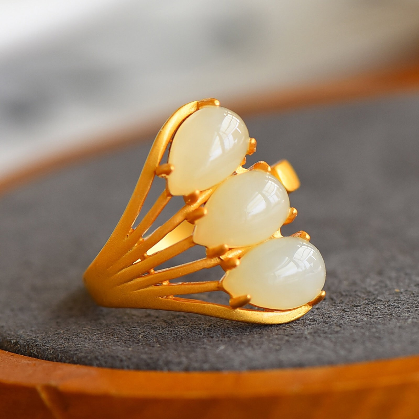 An Exquisite Sterling Silver-Gold Plated Inlaid White Jade Ring: Sterling Silver-Gold Plated Inlaid White Jade Ring , Size :6mmx9mm 纯银镀金镶白玉戒指,尺寸:6mmx9mm