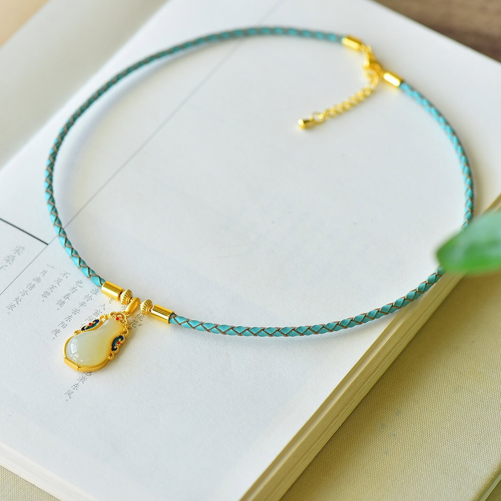 An Exquisite Sterling Silver-Gold Plated Inlaid White Jade Pendant: An Exquisite Sterling Silver-Gold Plated Inlaid White Jade Pendant 纯银镀金镶白玉吊坠