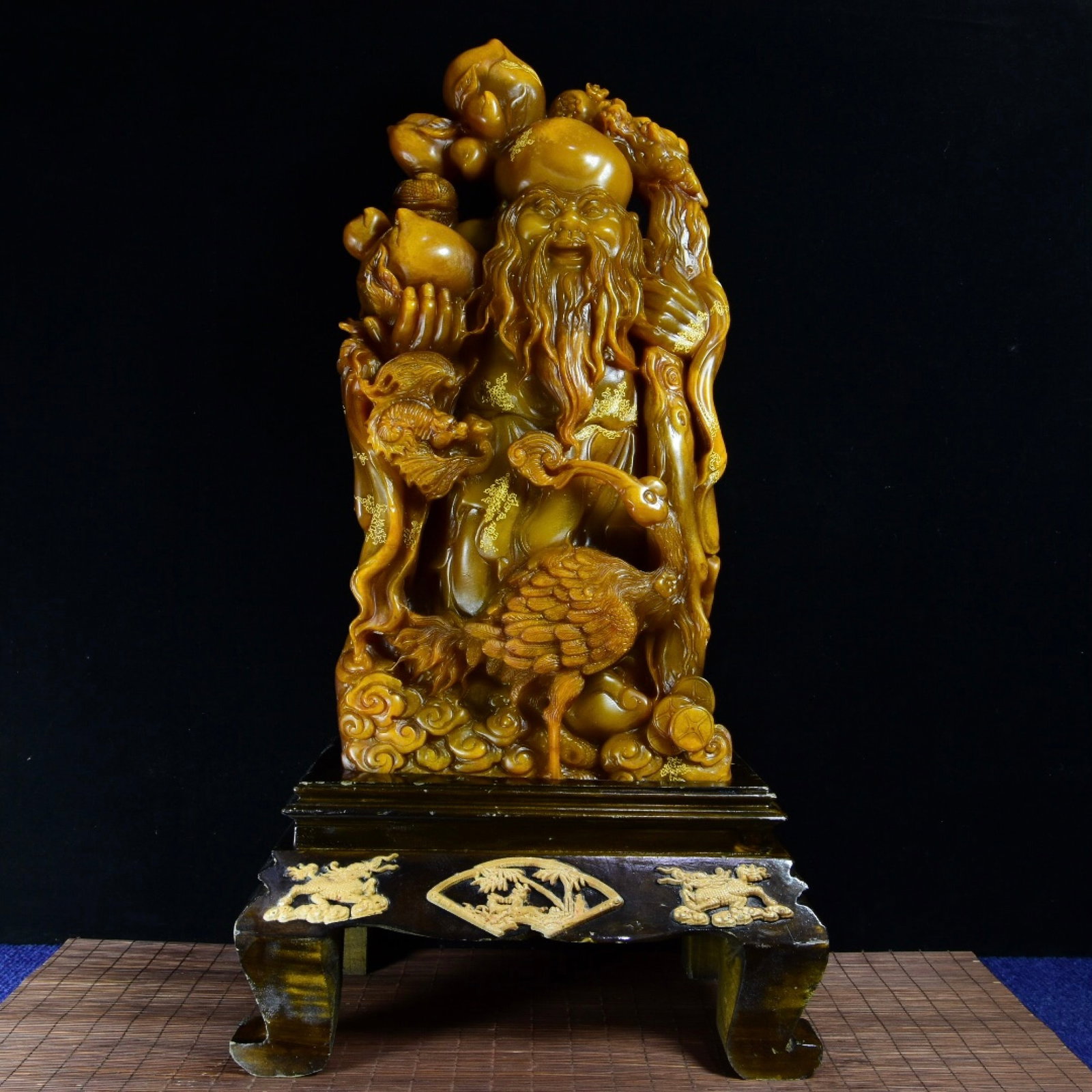 An Exquisite Tianhuang Stone Painted Gold Statue of Longevity Ornament: An Exquisite Tianhuang Stone Painted Gold Statue of Longevity Ornament,Qing Dynasty,China,Yuxuan Mark,Size:22.4inx8.3inx4.1in,Weight:10850g 田黄石描金寿星