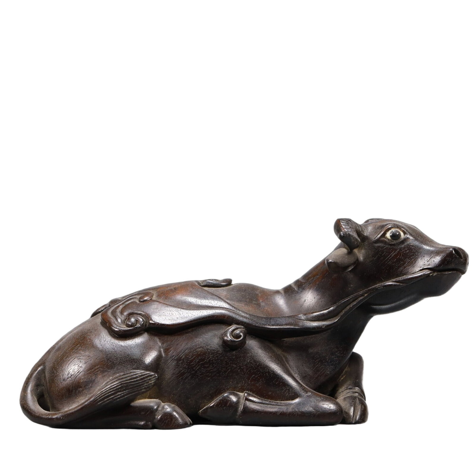 A Precious Zitanwood Buffalo: A Precious Zitanwood Buffalo. Chinese Qing Dynasty. Size:7.1inx3.1inx3.5in. Weight:370g. 清代 紫檀木牛摆件