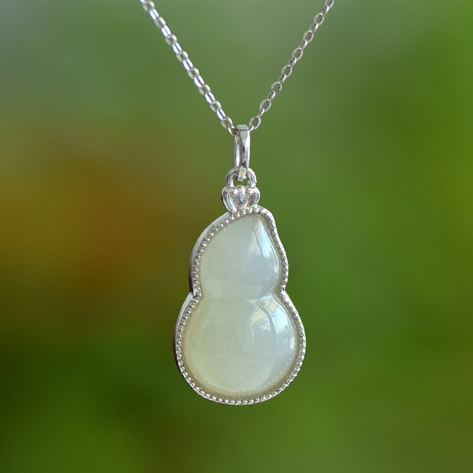 An Exquisite Sterling Silver Inlaid White Jade Enamel Gourd Pendant: An Exquisite Sterling Silver Inlaid White Jade Enamel Gourd Pendant 纯银镶白玉珐琅葫芦吊坠