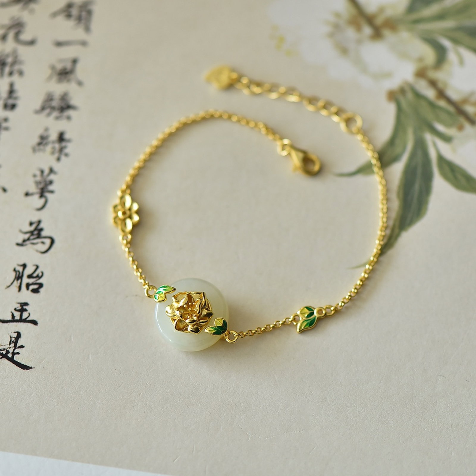 An Exquisite Sterling Silver-Gold Plated Inlaid White Jade Enamel Bracelets: An Exquisite Sterling Silver-Gold Plated Inlaid White Jade Enamel Bracelets,Size: 15mmx15mm 纯银镀金镶白玉珐琅手链