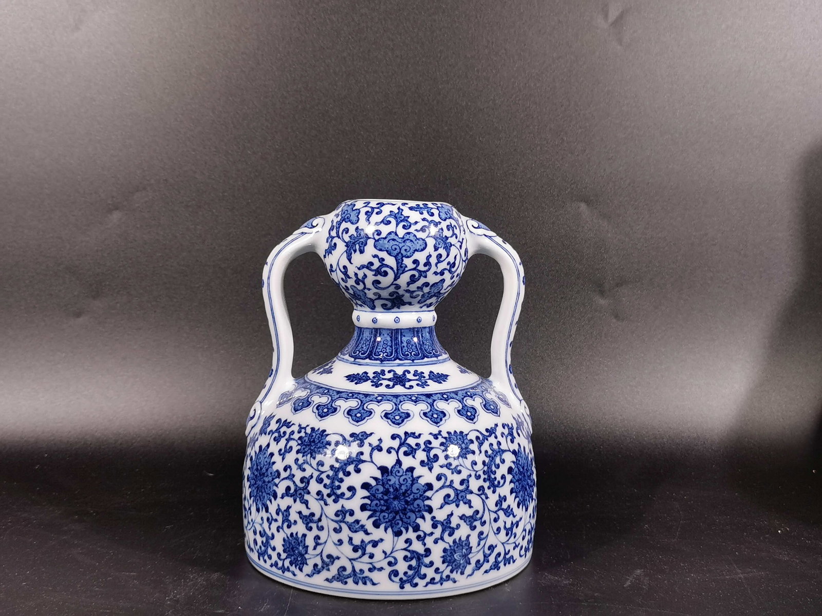 An Exquisite Blue and White Lotus Pattern Double-Ears Vase: An Exquisite Blue and White Lotus Pattern Double-Ears Vase,Qing Dynasty,China,Qianlong Six-character Mark,Size:7.2inx5.9in ????????????,????,?????